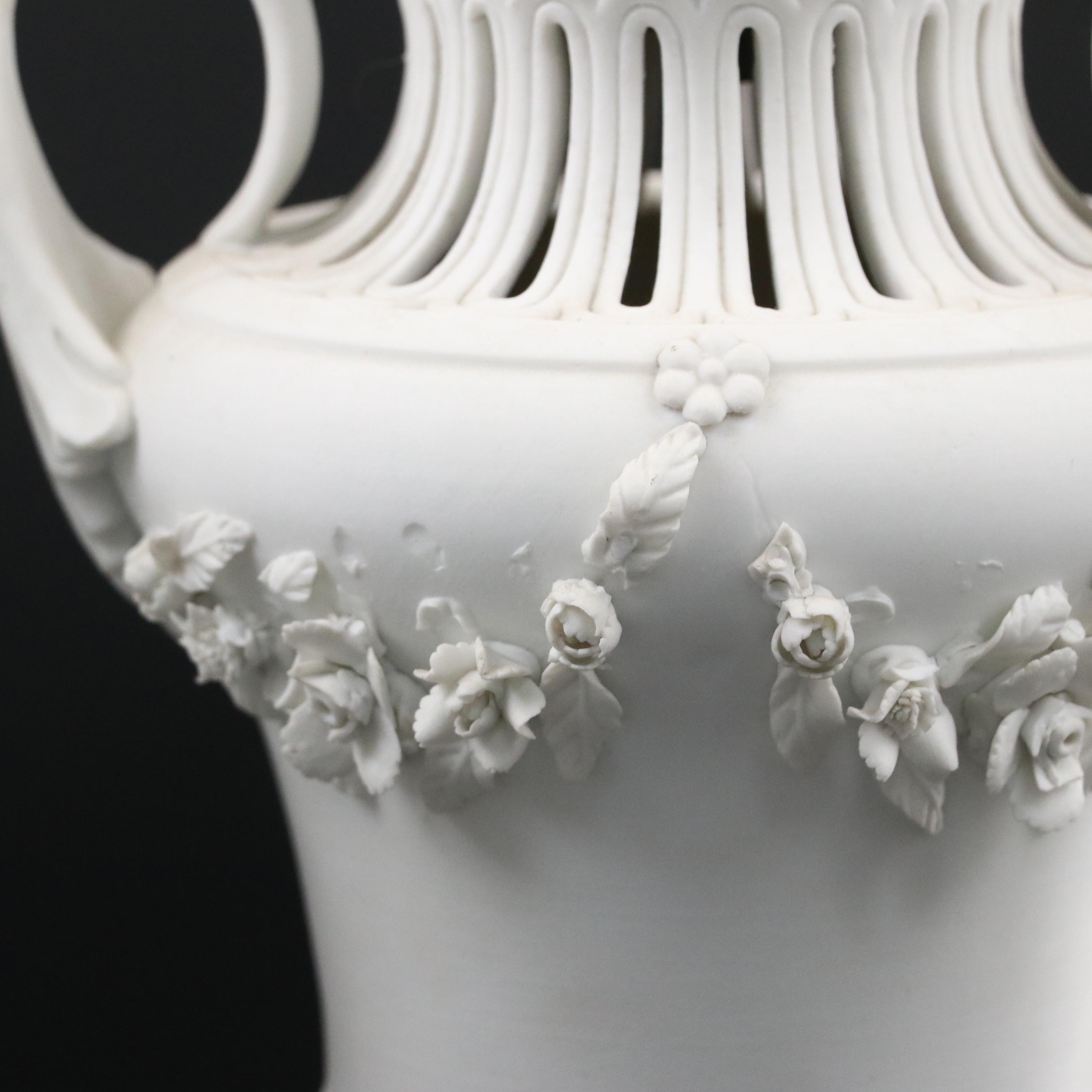 Pair of French Style Ormolu Mounted Bisque Covered Vases with Applied Rose Swags