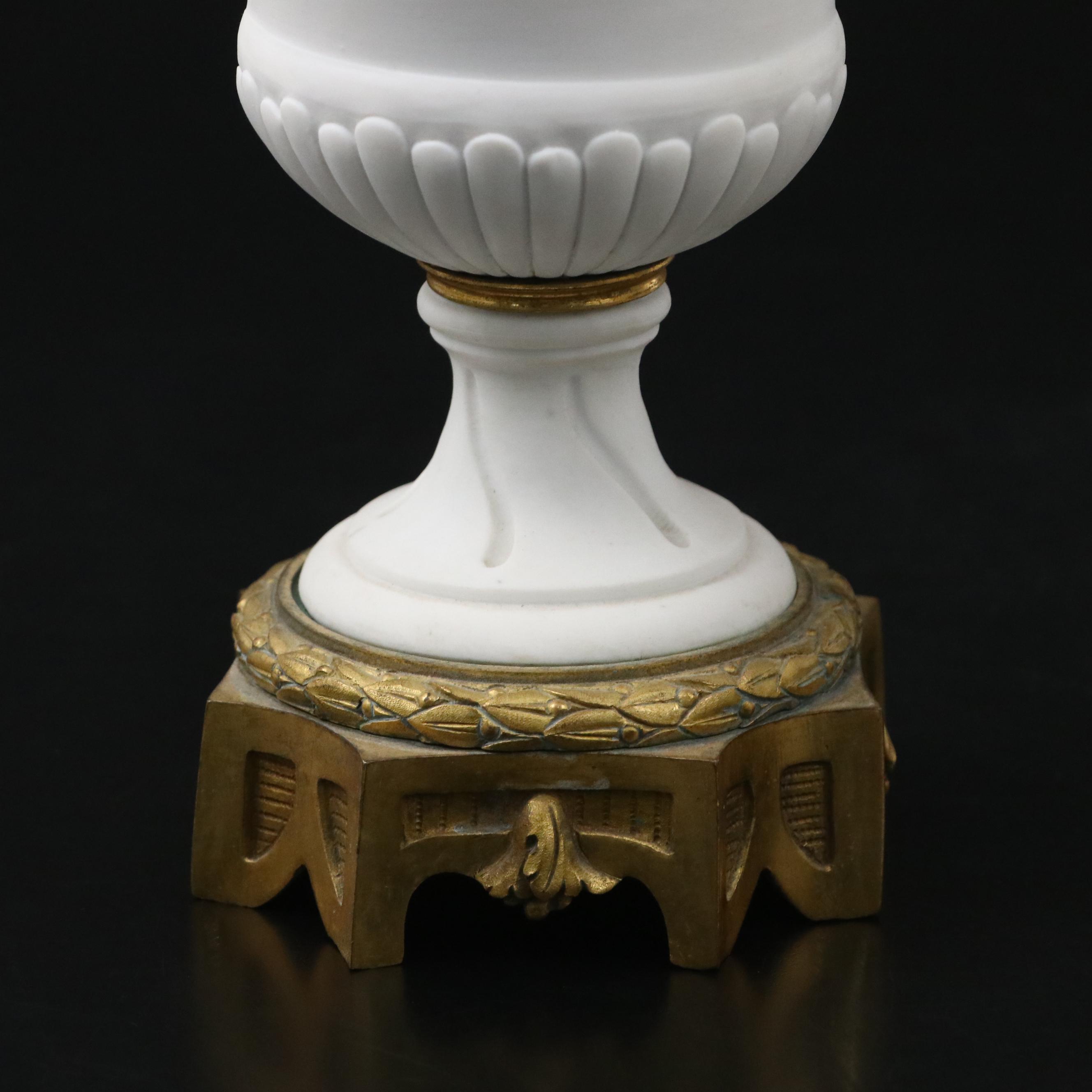 Pair of French Style Ormolu Mounted Bisque Covered Vases with Applied Rose Swags