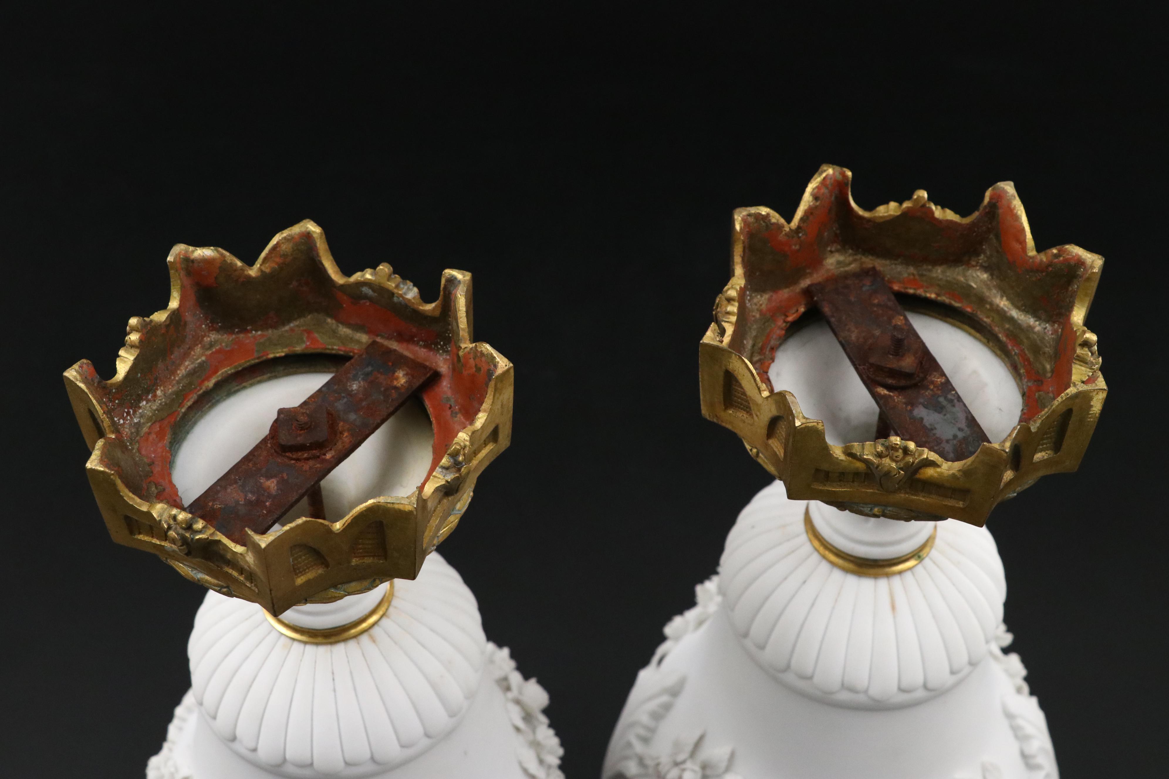 Pair of French Style Ormolu Mounted Bisque Covered Vases with Applied Rose Swags