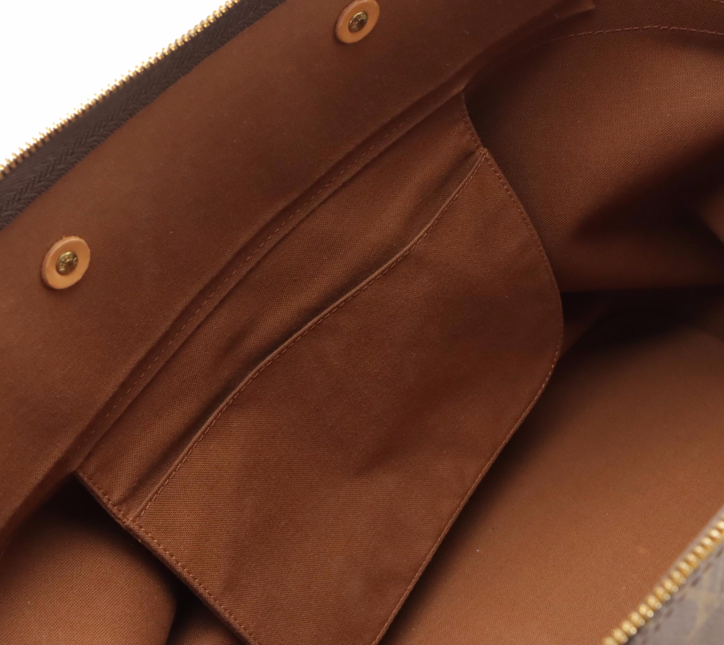 Louis Vuitton Cruiser 40 Travel Bag in Monogram Canvas and Vachetta Leather