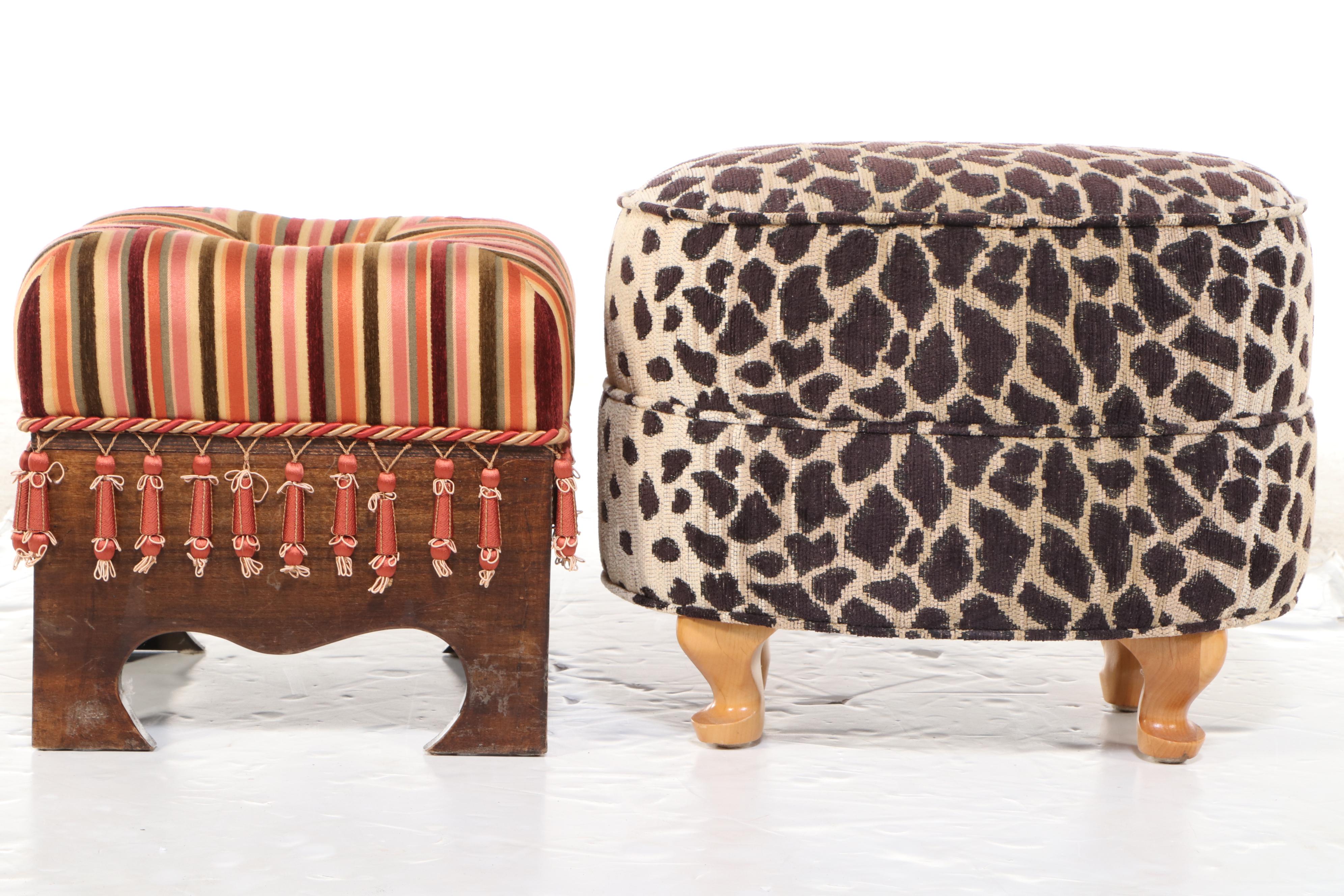Two Upholstered Wood Footstools Featuring Animal Print and Tassels