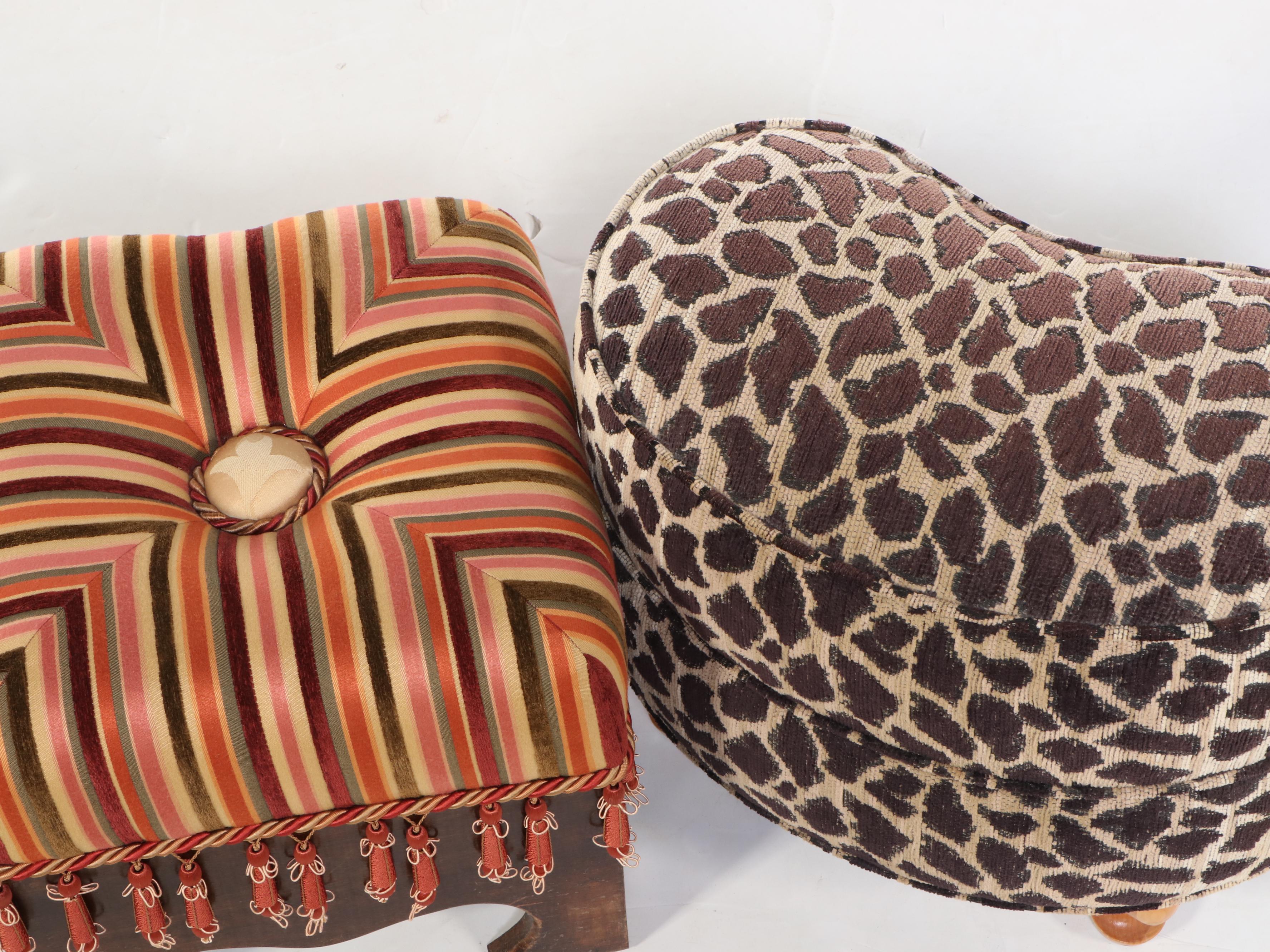 Two Upholstered Wood Footstools Featuring Animal Print and Tassels