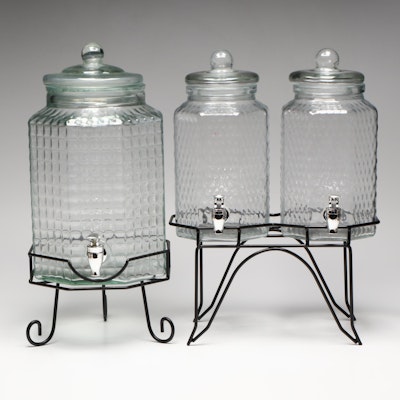 Three and Twin One Gallon Glass Drink Dispensers with Metal Stands Three and Twin One Gallon Glass Drink Dispensers with Metal Stands