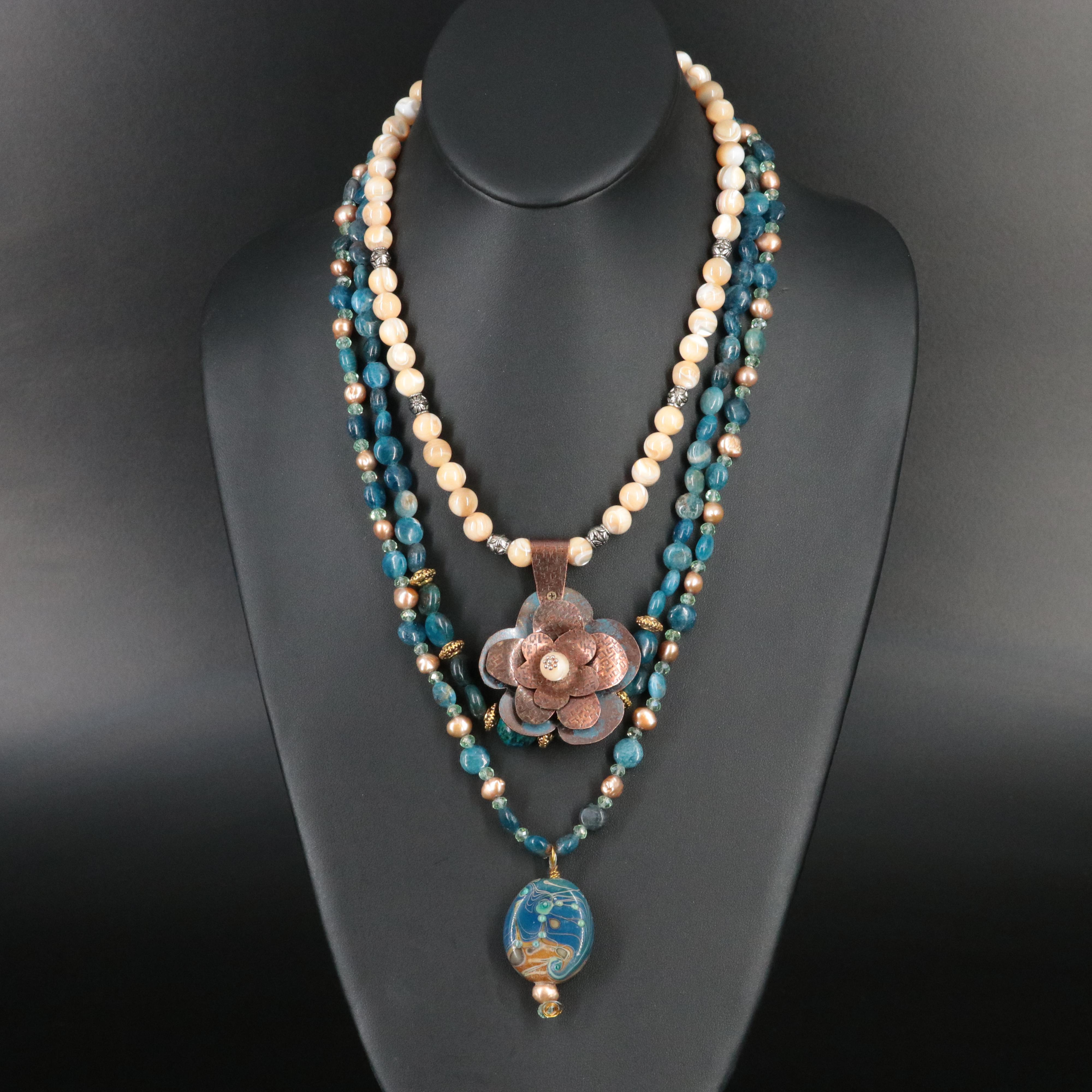 Mother-of-Pearl, Art Glass and Apatite Featured in Necklaces
