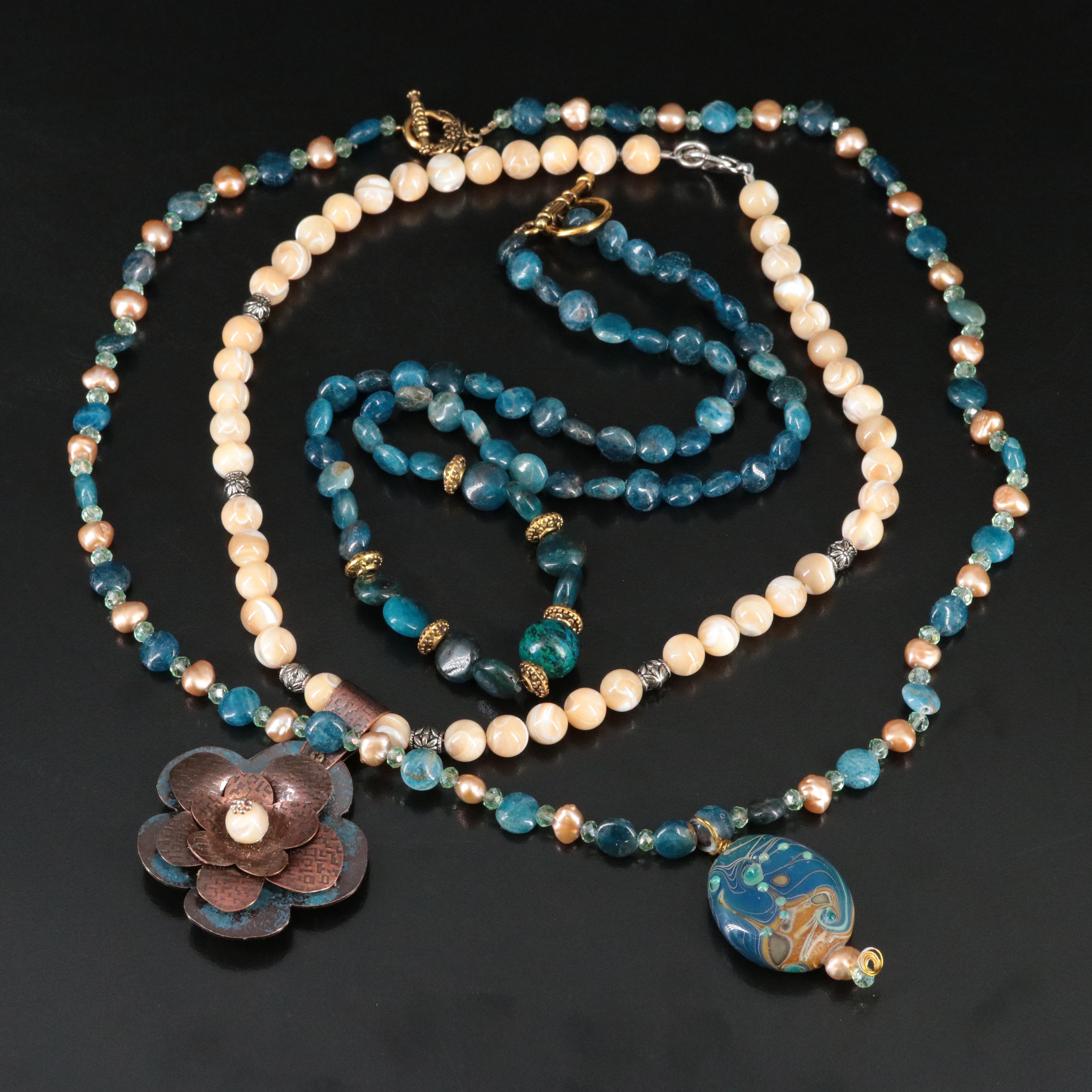 Mother-of-Pearl, Art Glass and Apatite Featured in Necklaces