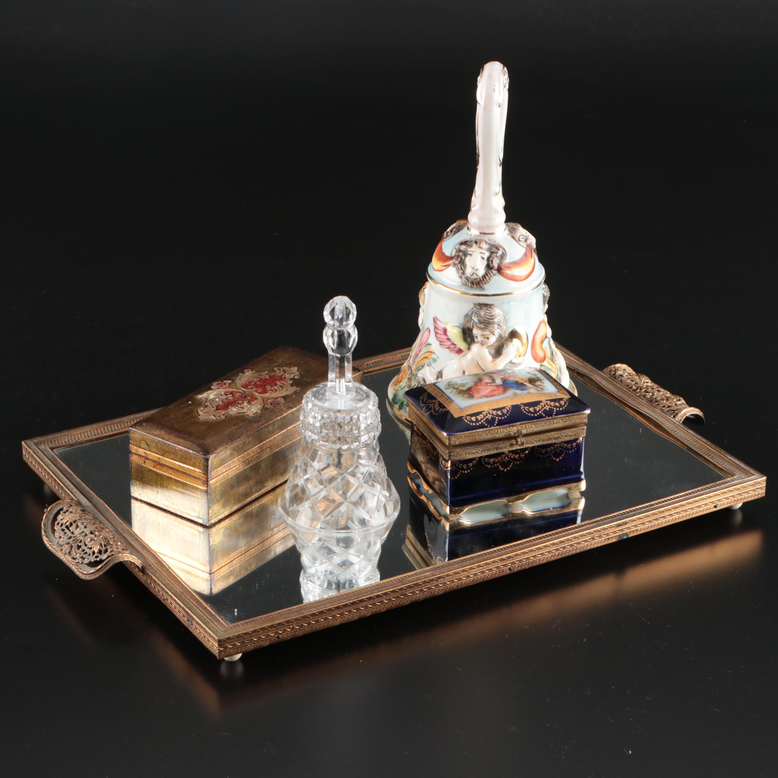 Capodimonte Porcelain Bell, Crystal Bell, Mirrored Tray, and Other Table Décor
