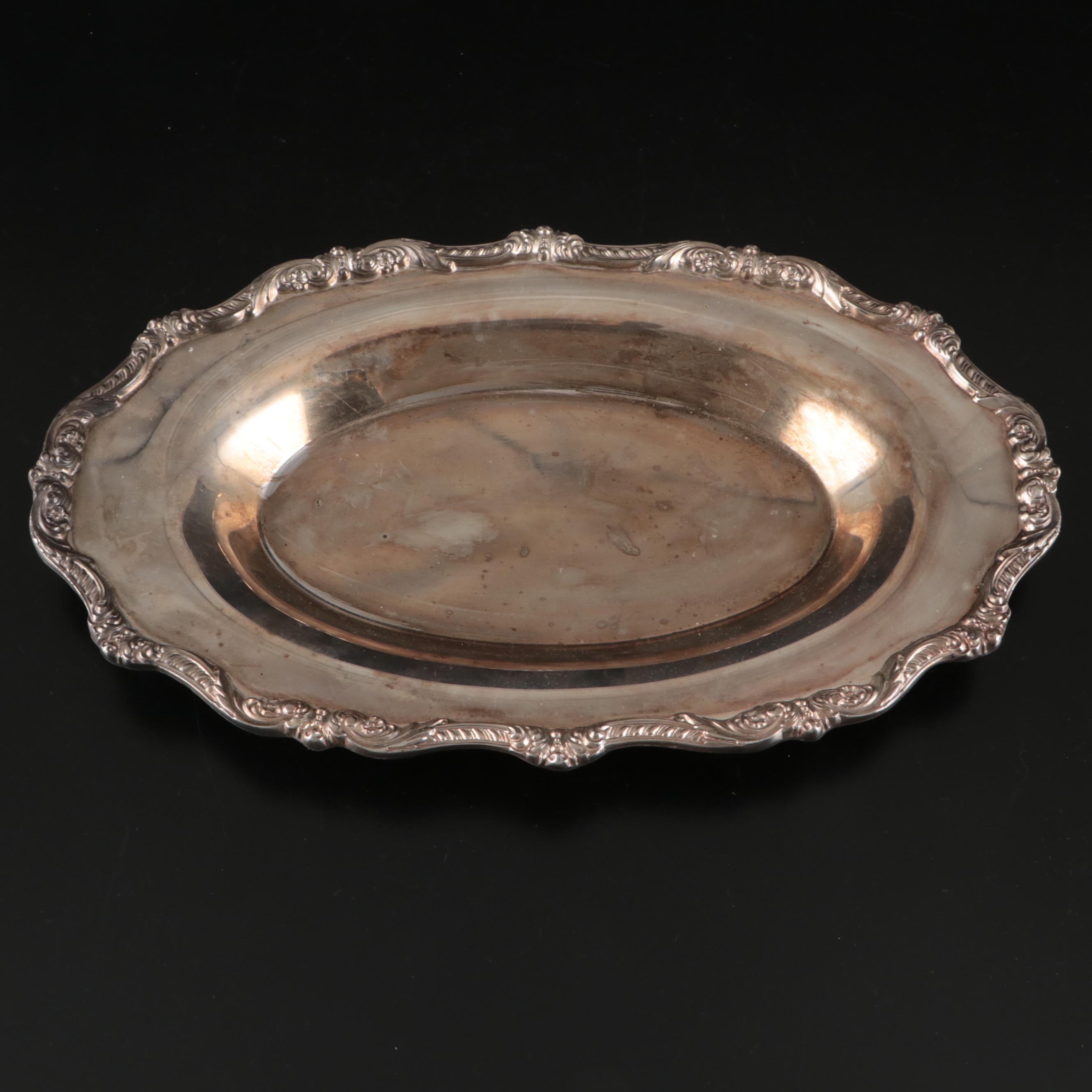 Trumpet Vase with Other Silver Plate Serving Pieces, 20th Century