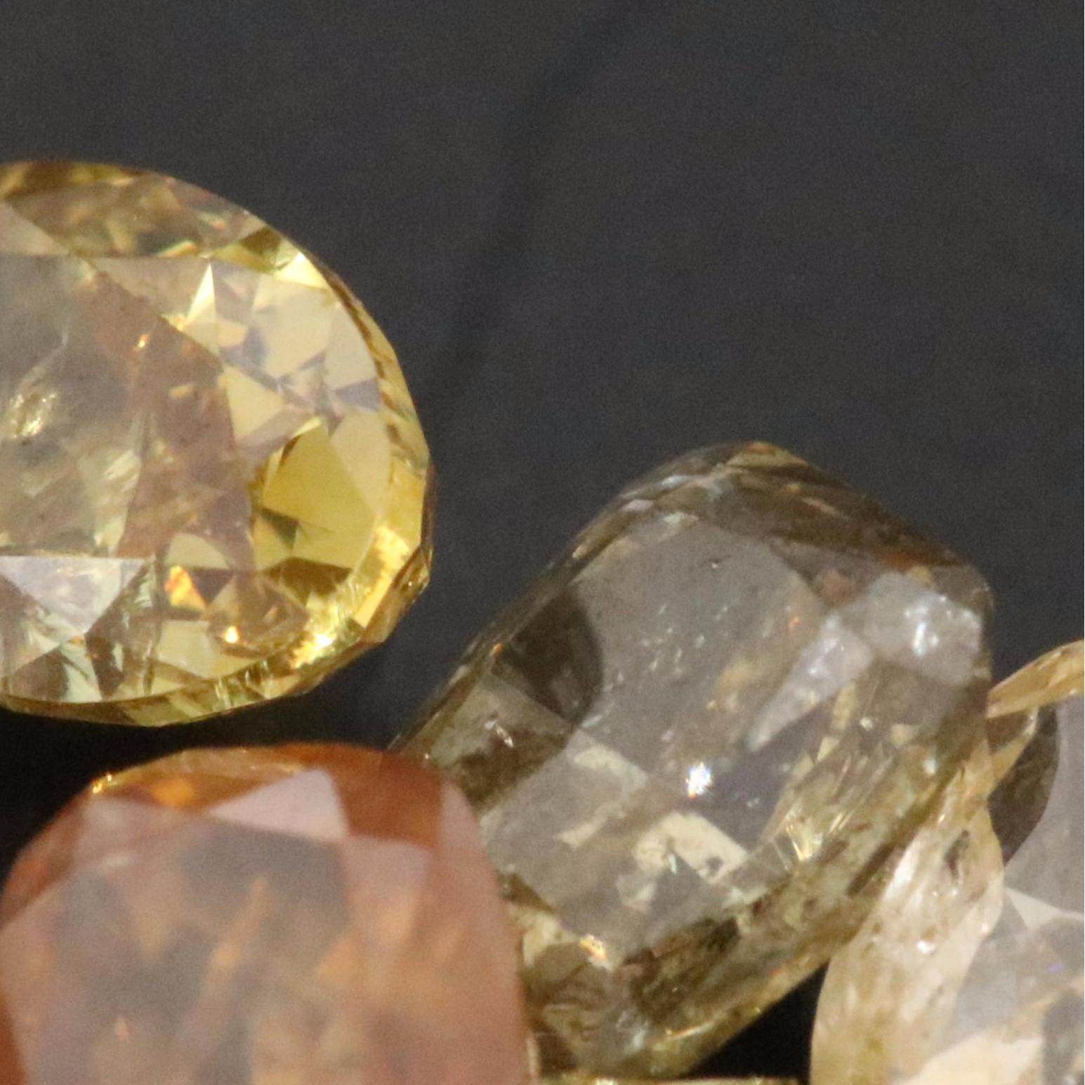 Loose 1.01 CTW Fancy Yellow and Fancy Orange Diamonds