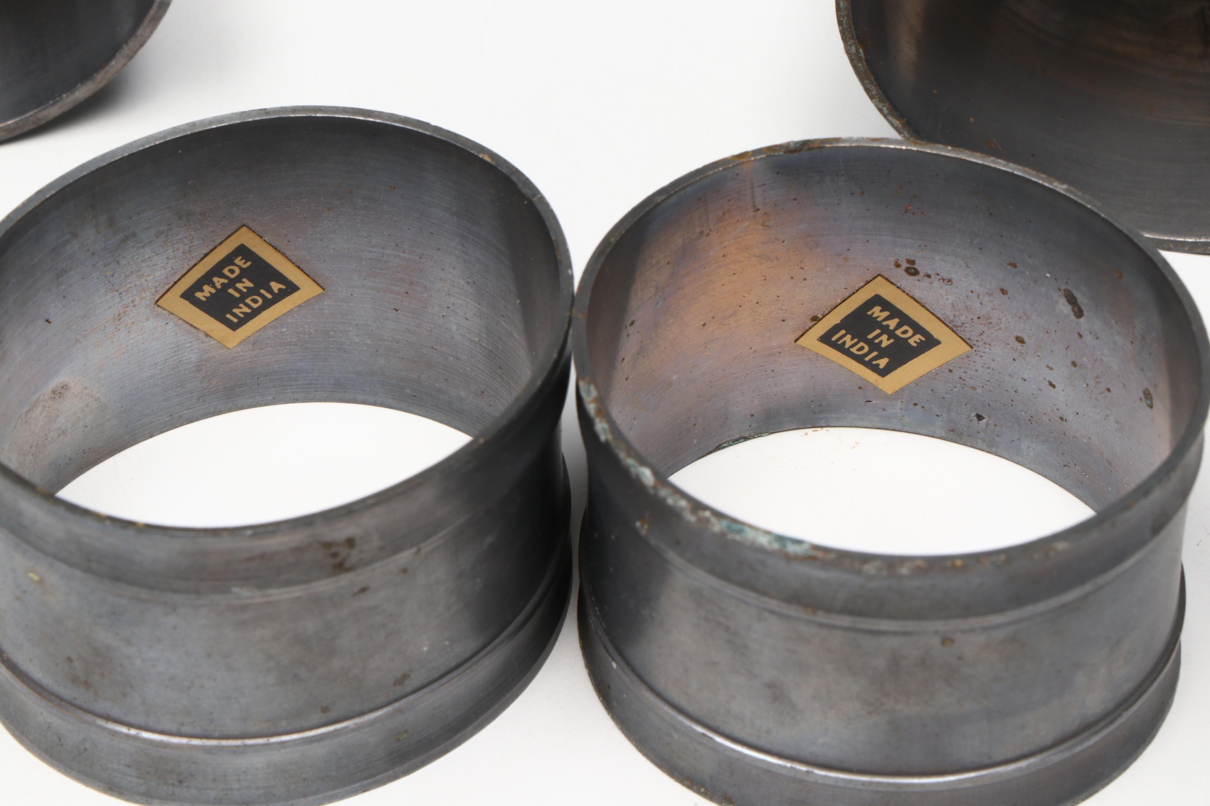 Pewter Plates and Napkin Rings with Other Table Accessories