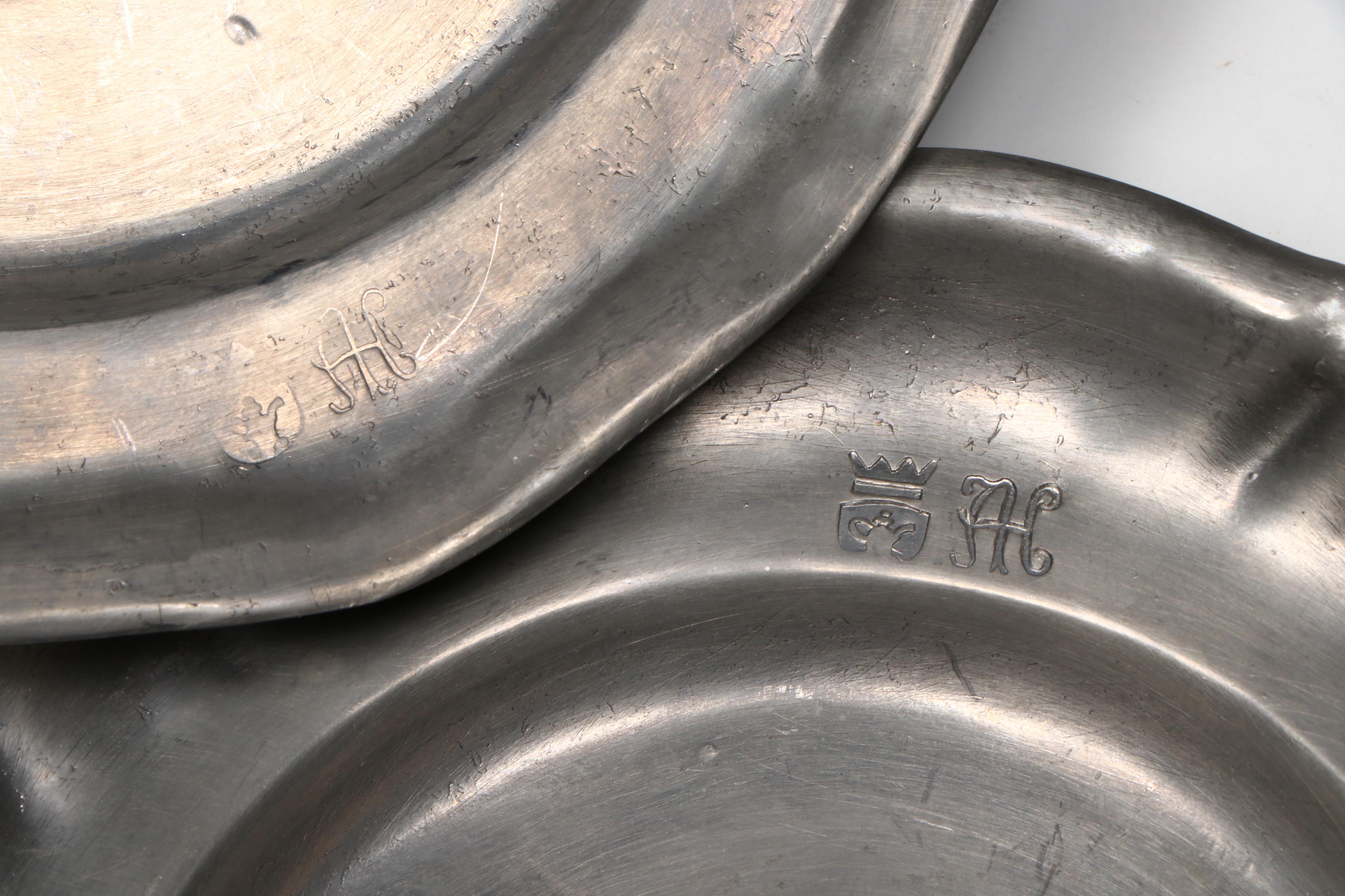 Pewter Plates and Napkin Rings with Other Table Accessories