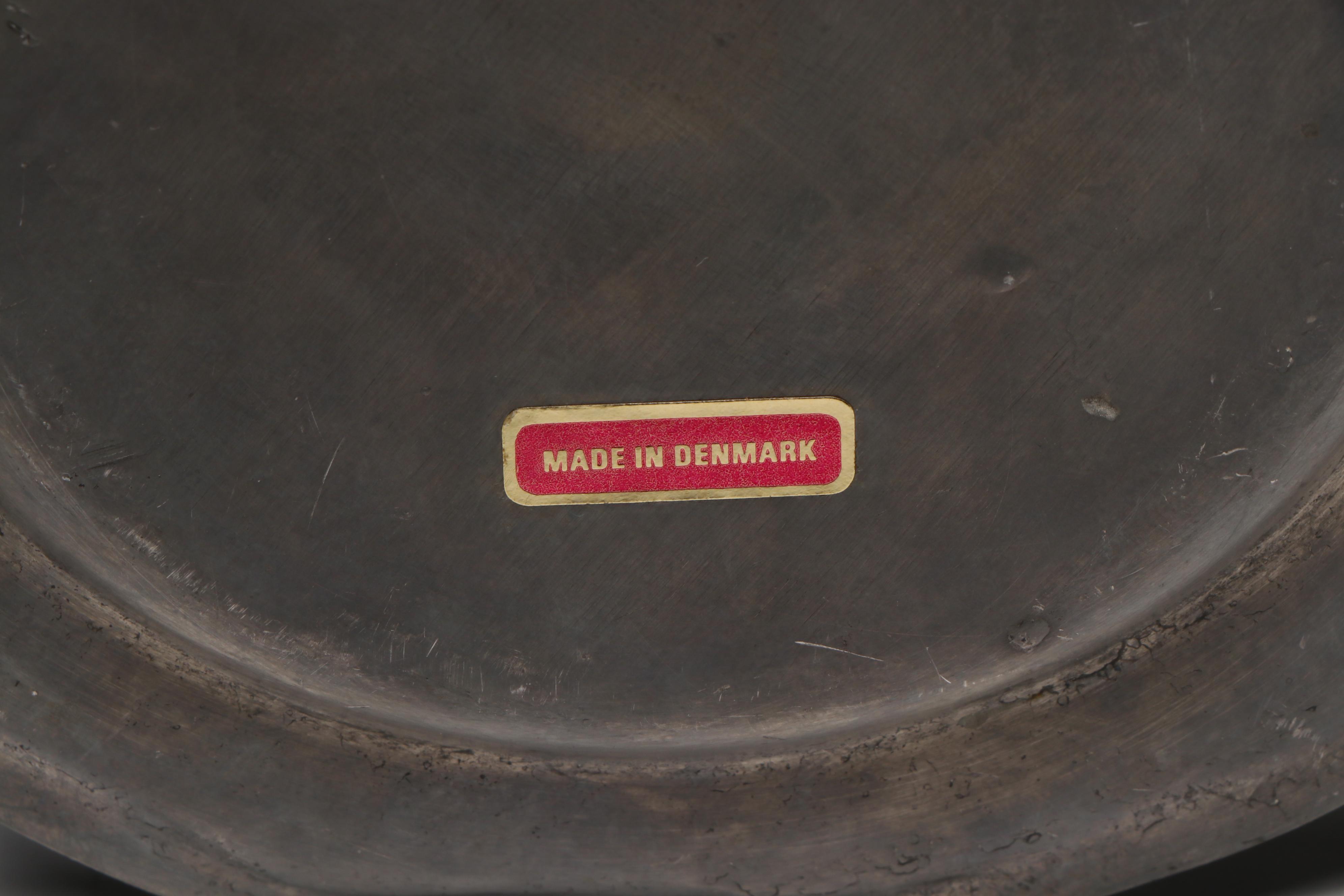 Pewter Plates and Napkin Rings with Other Table Accessories