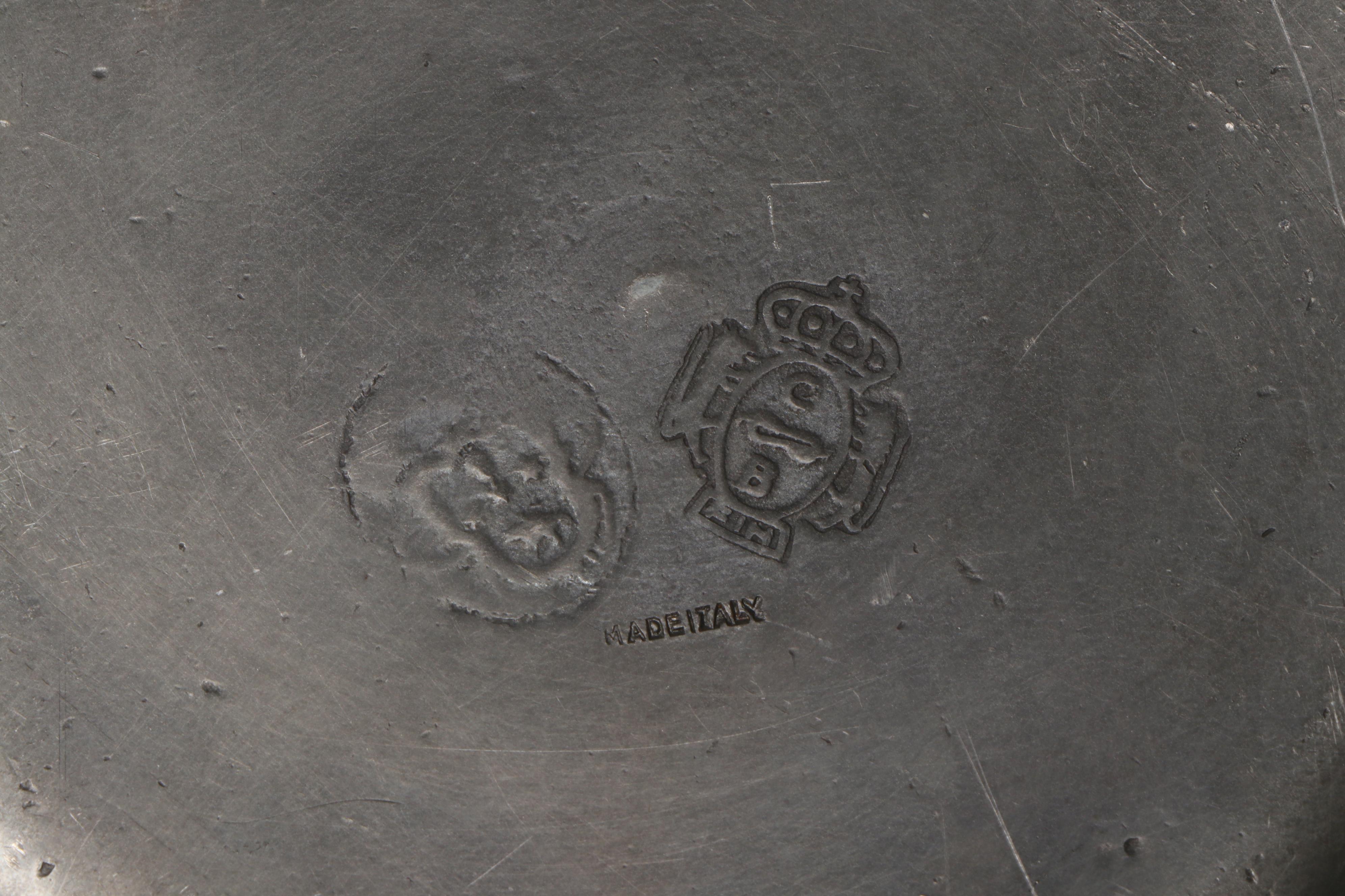 Pewter Plates and Napkin Rings with Other Table Accessories