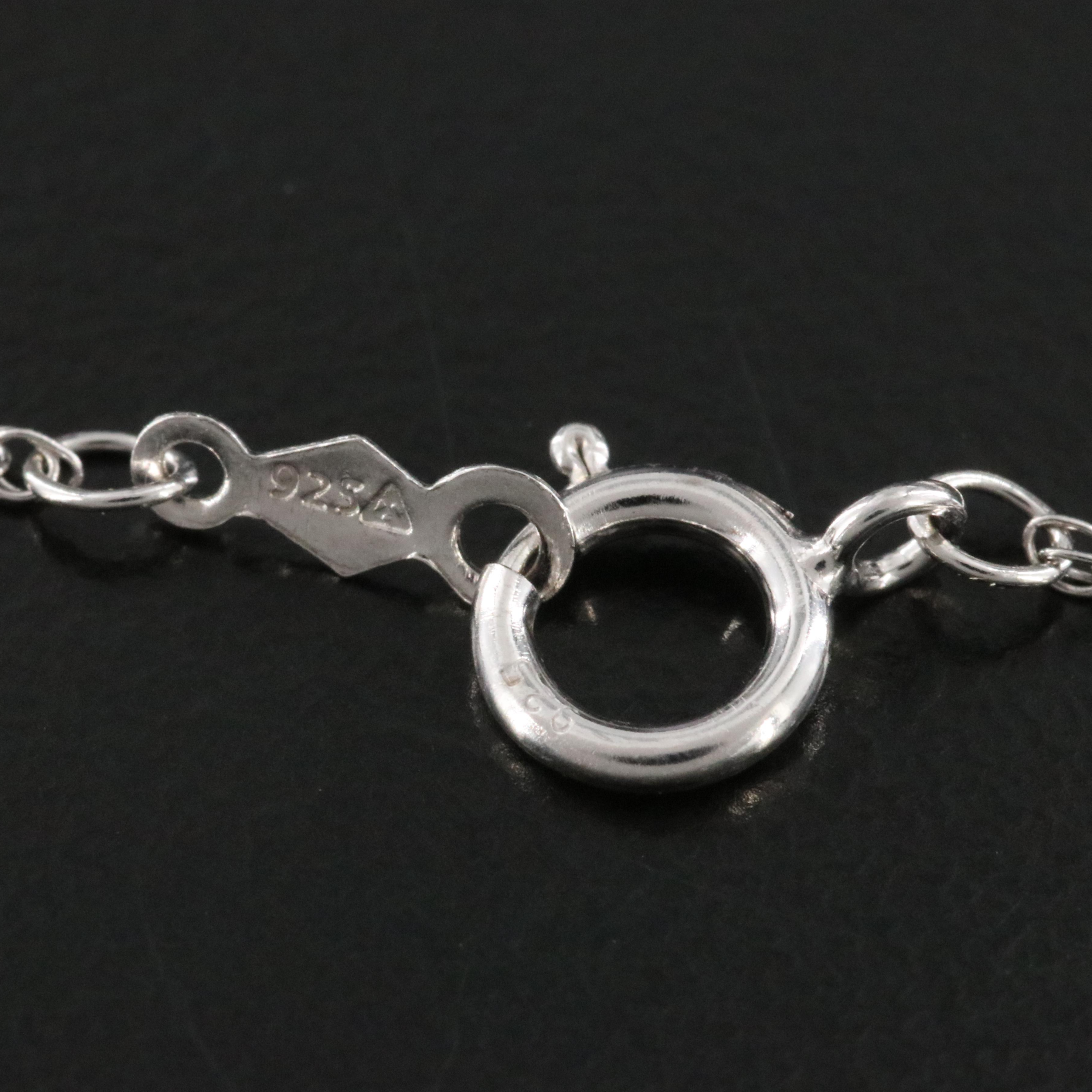 Sterling Tanzanite and Diamond Knot Shimmer Pendant Necklace