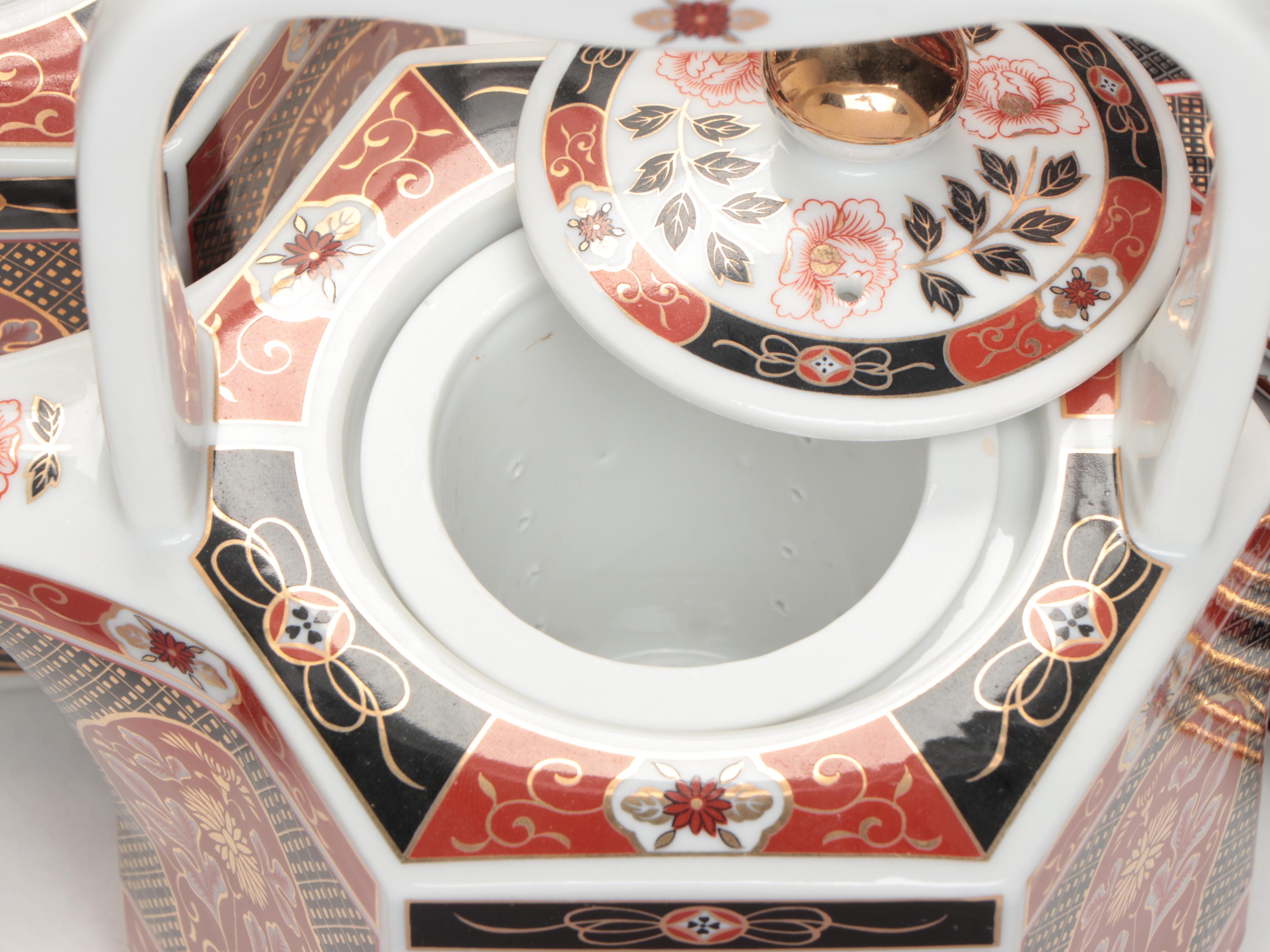 Takahashi Japanese Porcelain "Gold Mum" Dinnerware and Teapots