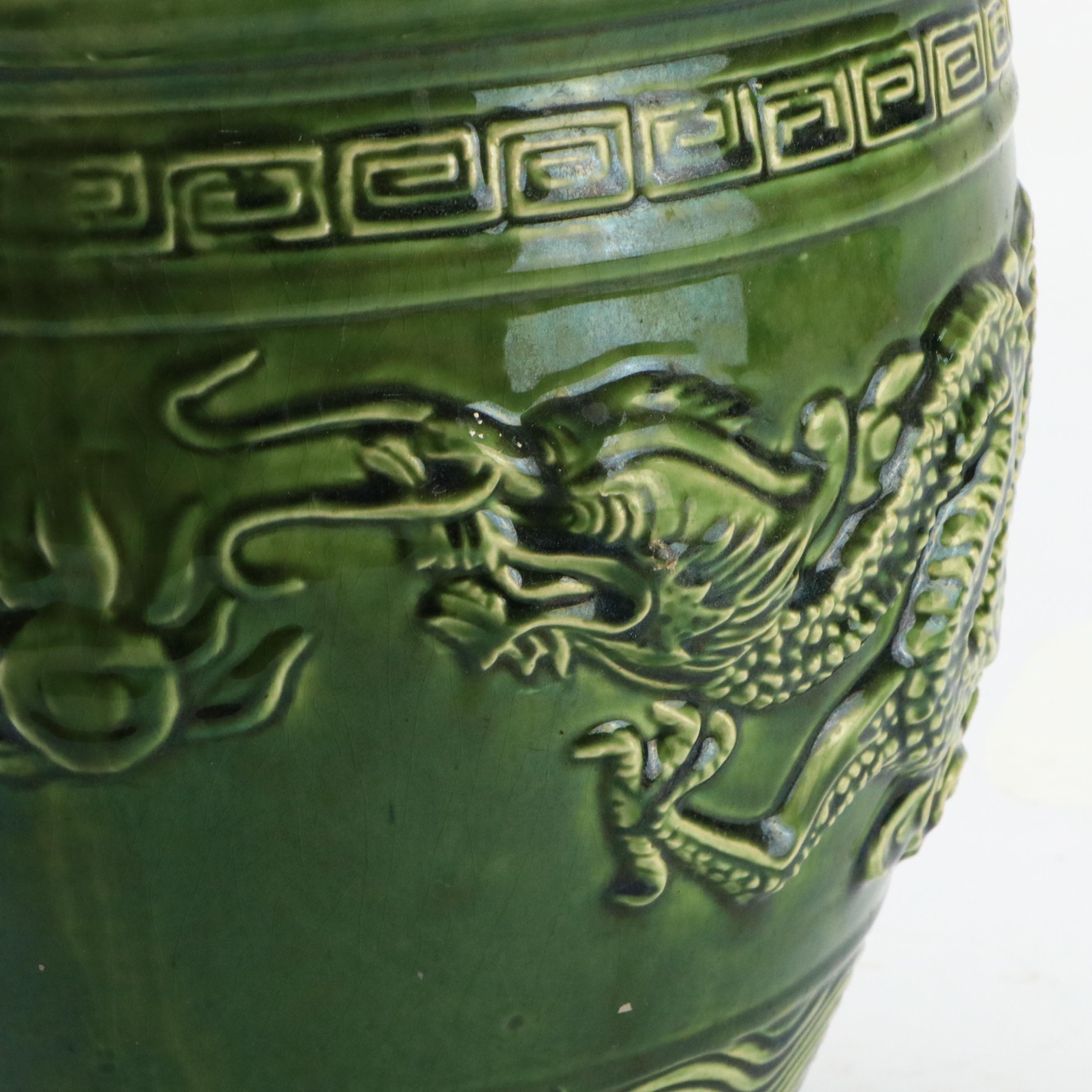 Chinese Green Jardinière with High Relief Dragons, and Three Matching Risers