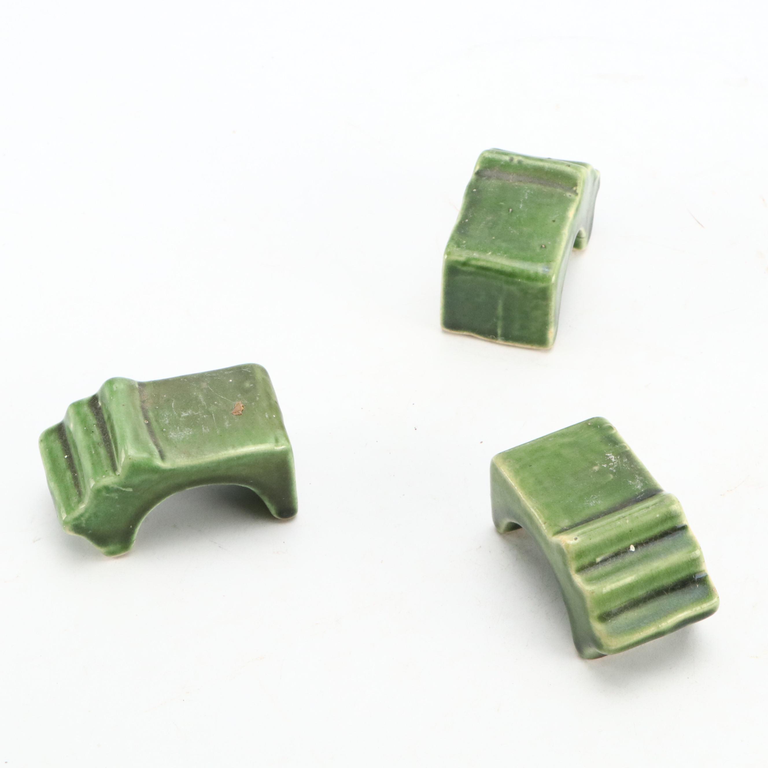 Chinese Green Jardinière with High Relief Dragons, and Three Matching Risers