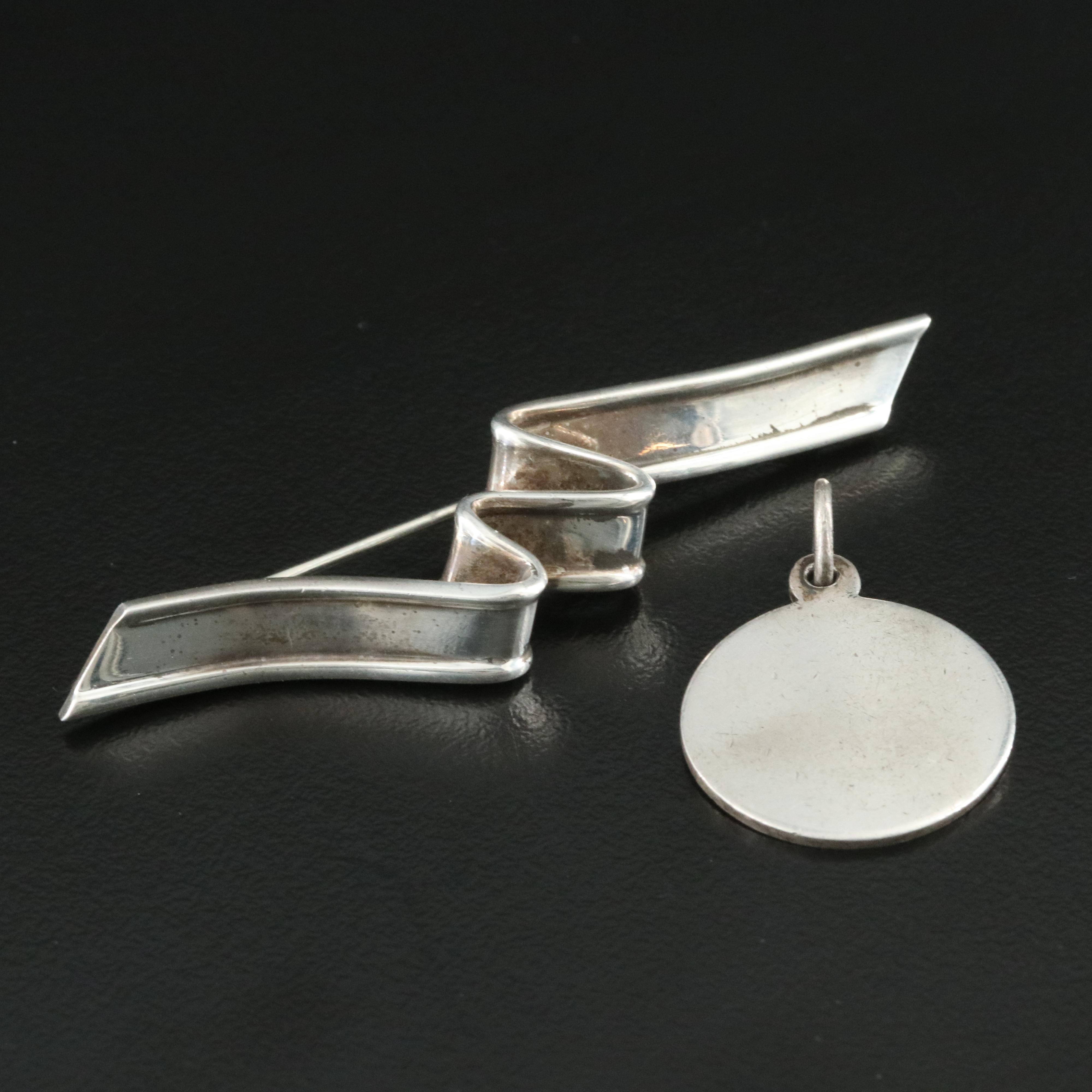 Tiffany & Co. Sterling Ribbon Brooch and Round Disc Charm