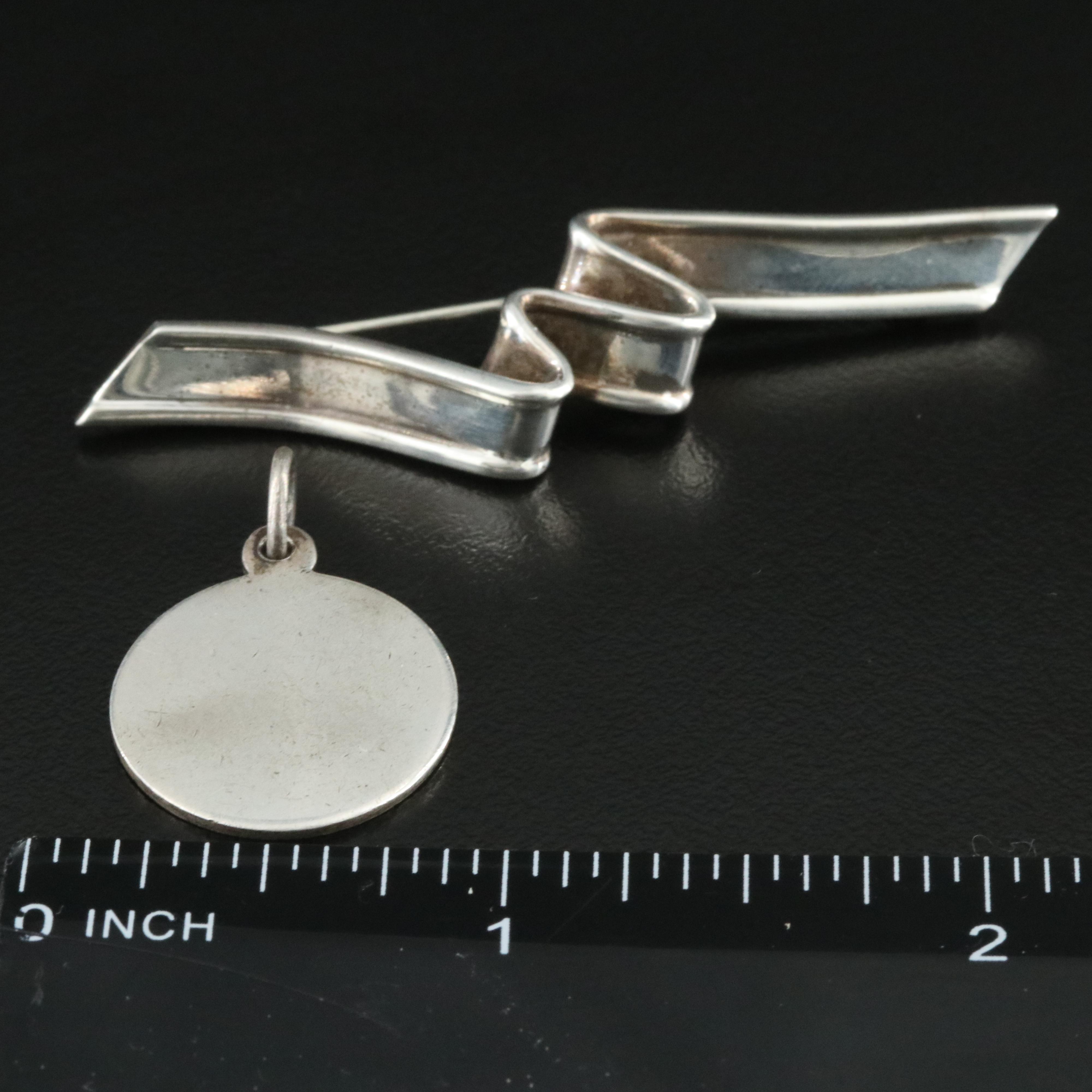 Tiffany & Co. Sterling Ribbon Brooch and Round Disc Charm