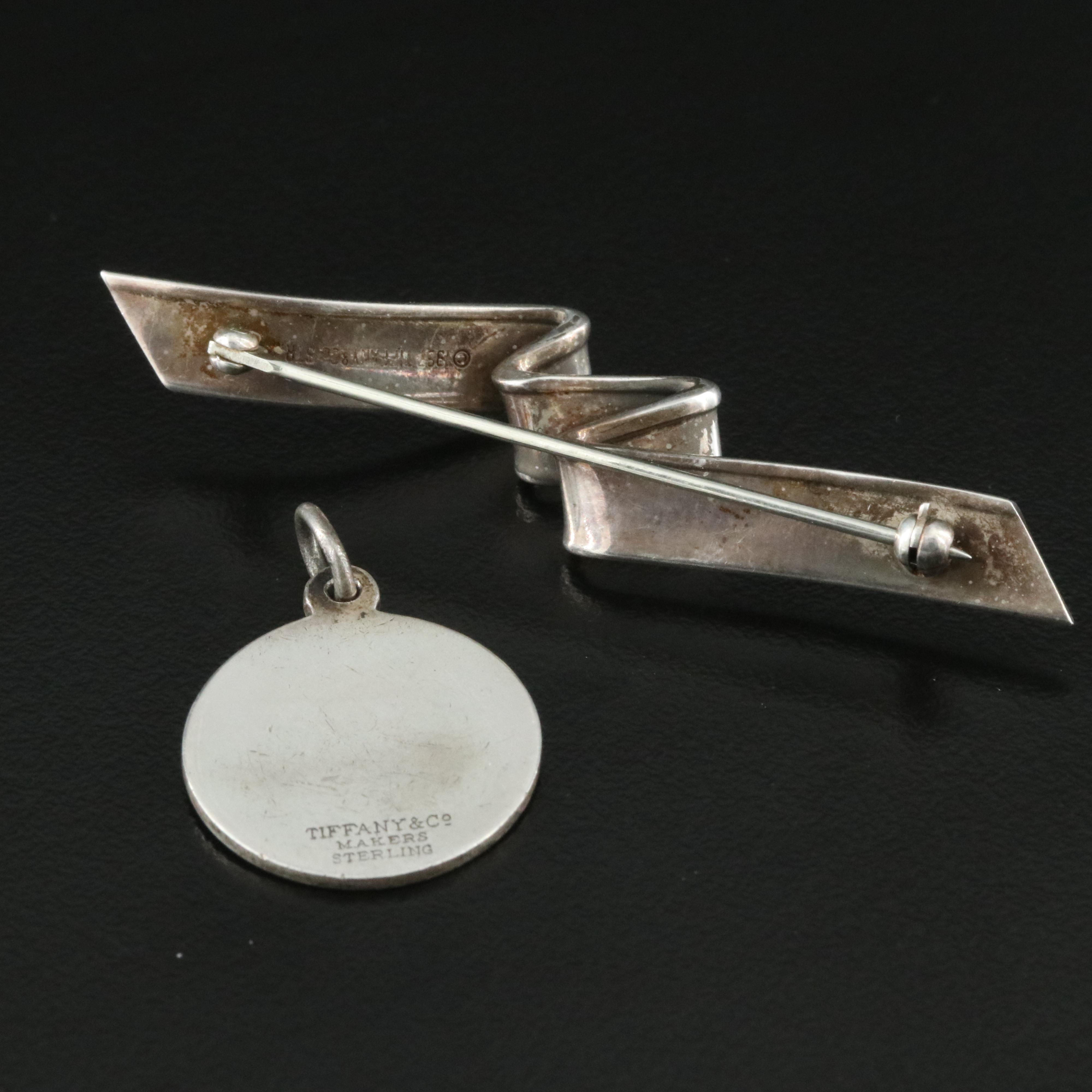 Tiffany & Co. Sterling Ribbon Brooch and Round Disc Charm