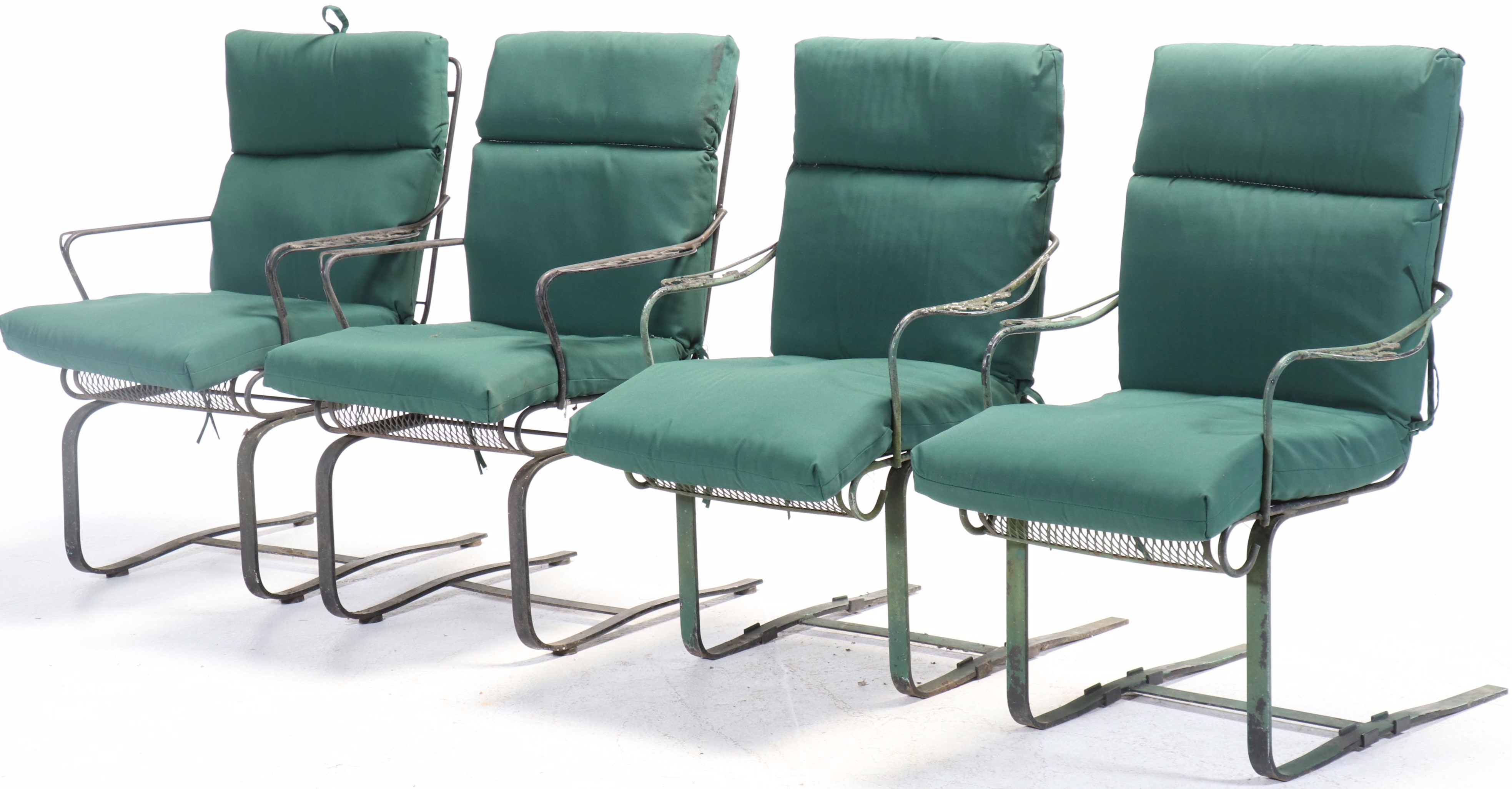 Set of Four Wrought Iron Cantilever Patio Chairs with Nesting Tables