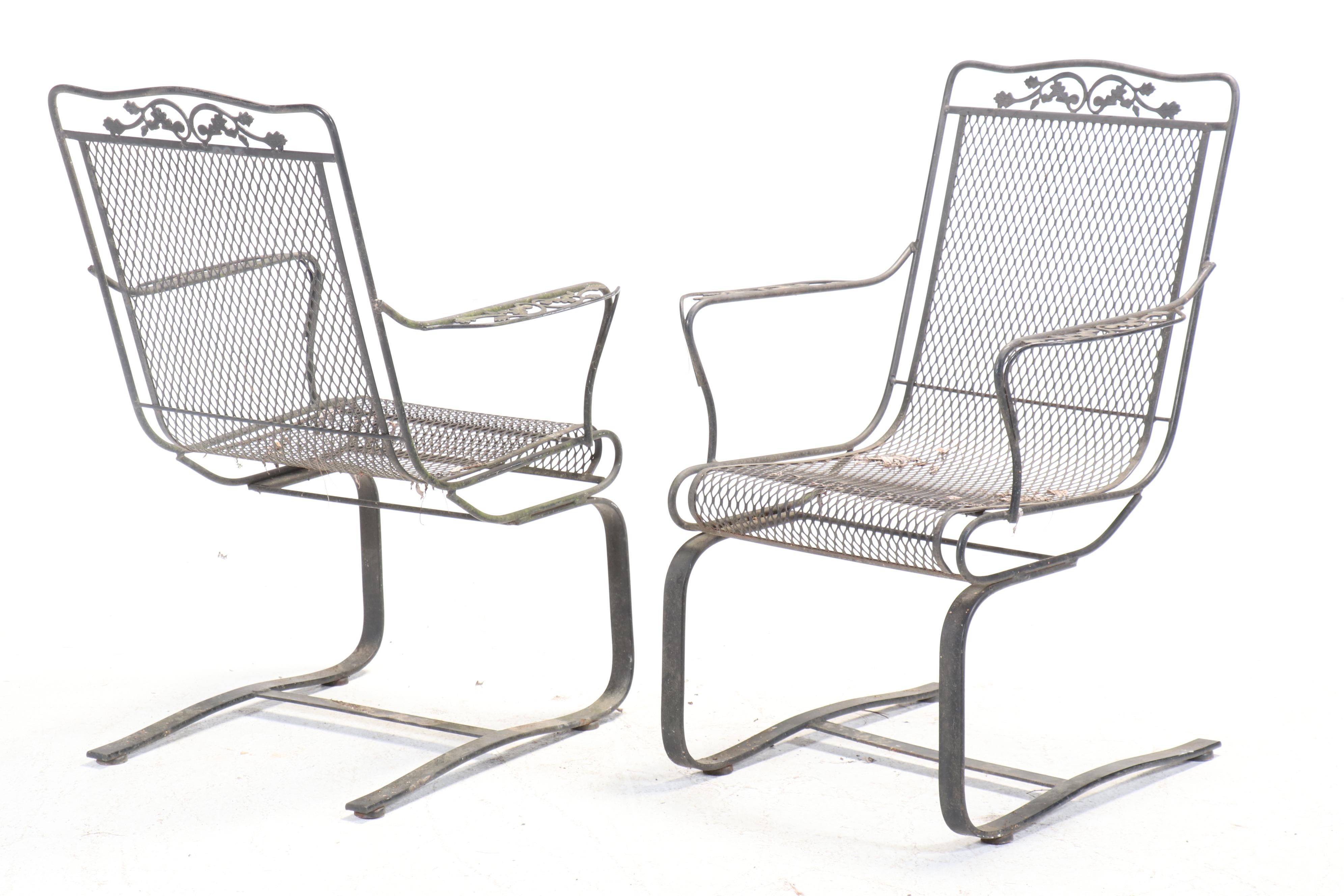 Set of Four Wrought Iron Cantilever Patio Chairs with Nesting Tables