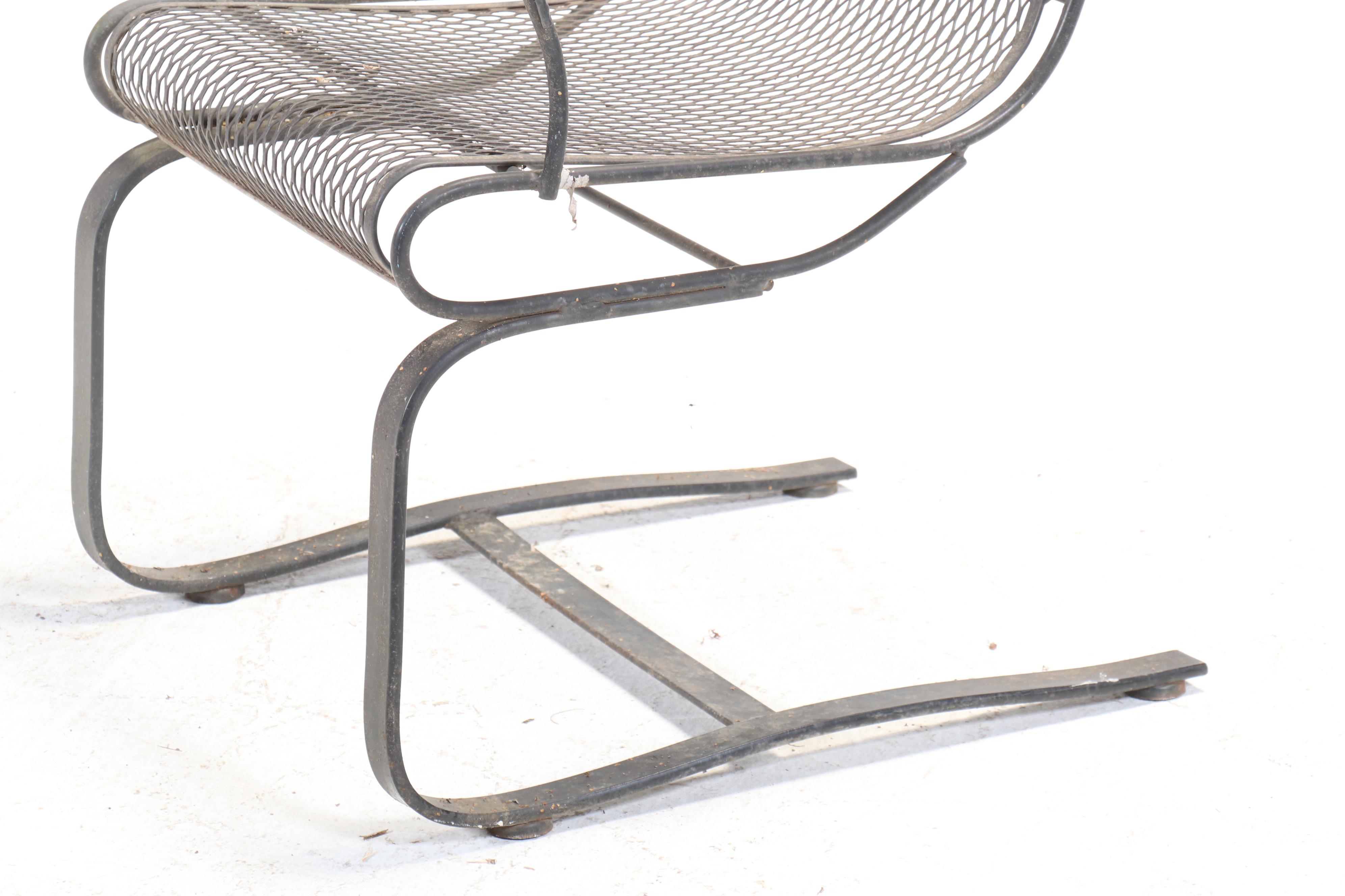 Set of Four Wrought Iron Cantilever Patio Chairs with Nesting Tables