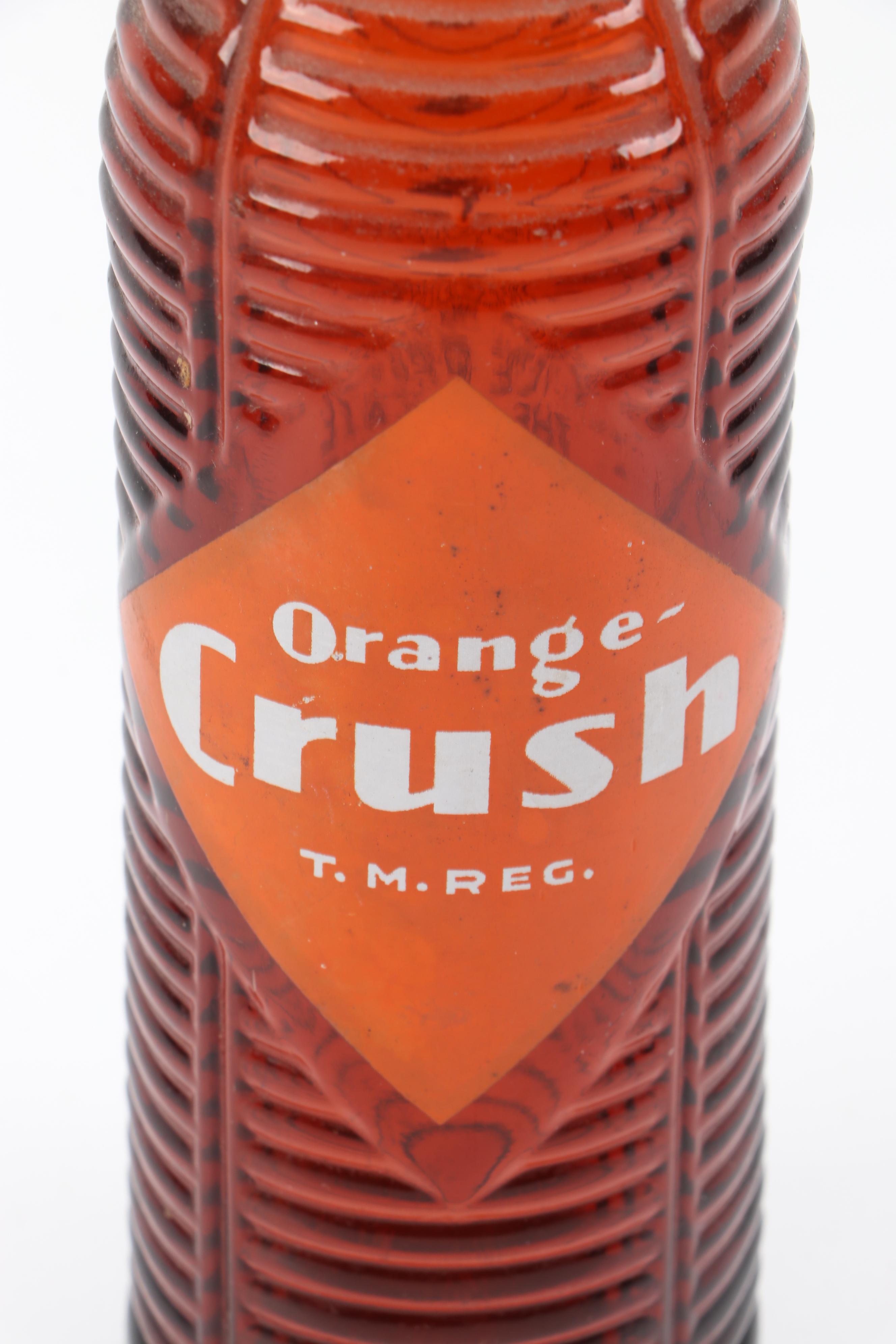 Orange Abstract Swirl Sculpture with Orange Crush Beehive Bottle