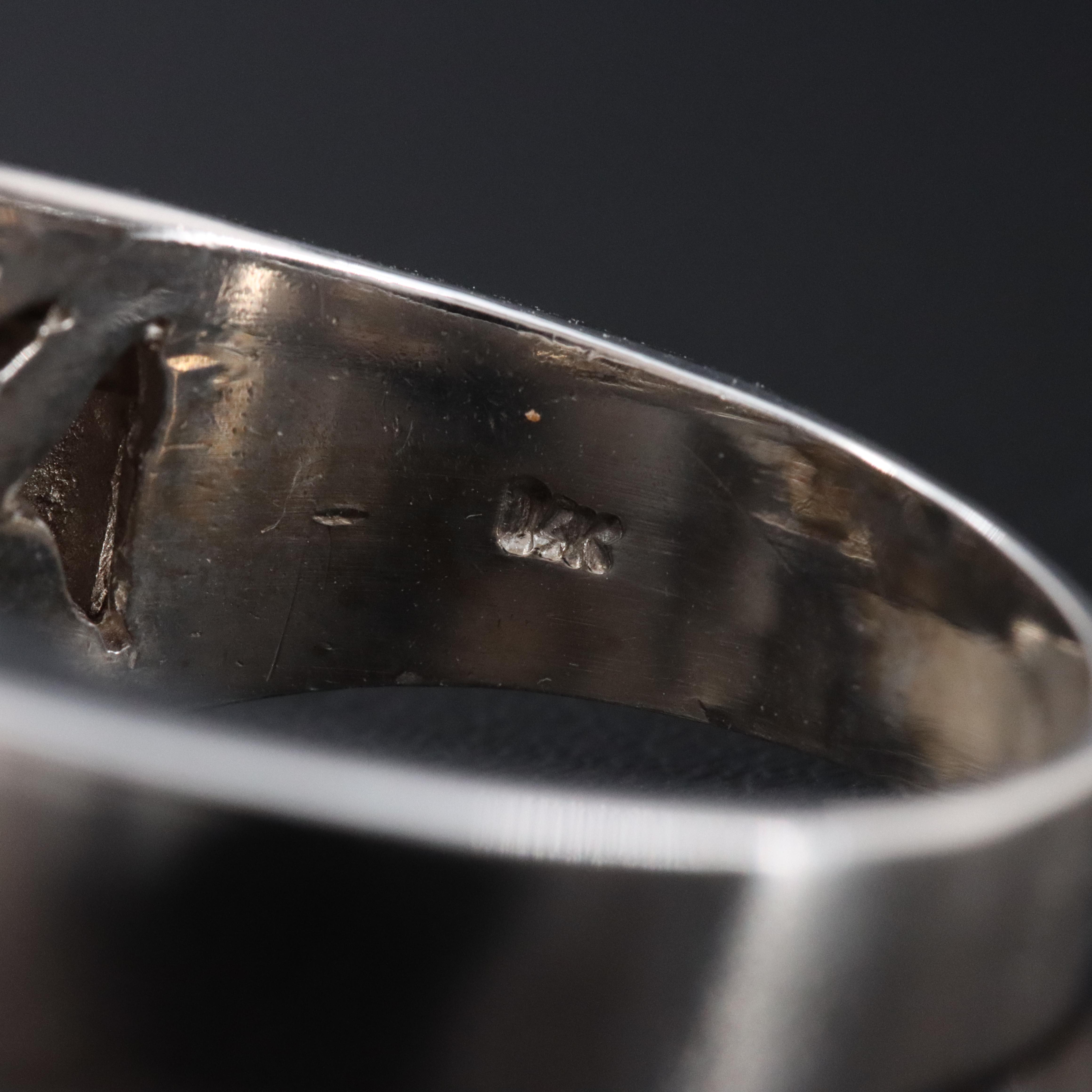 14K 0.96 CTW Diamond Interlocking Loop Ring