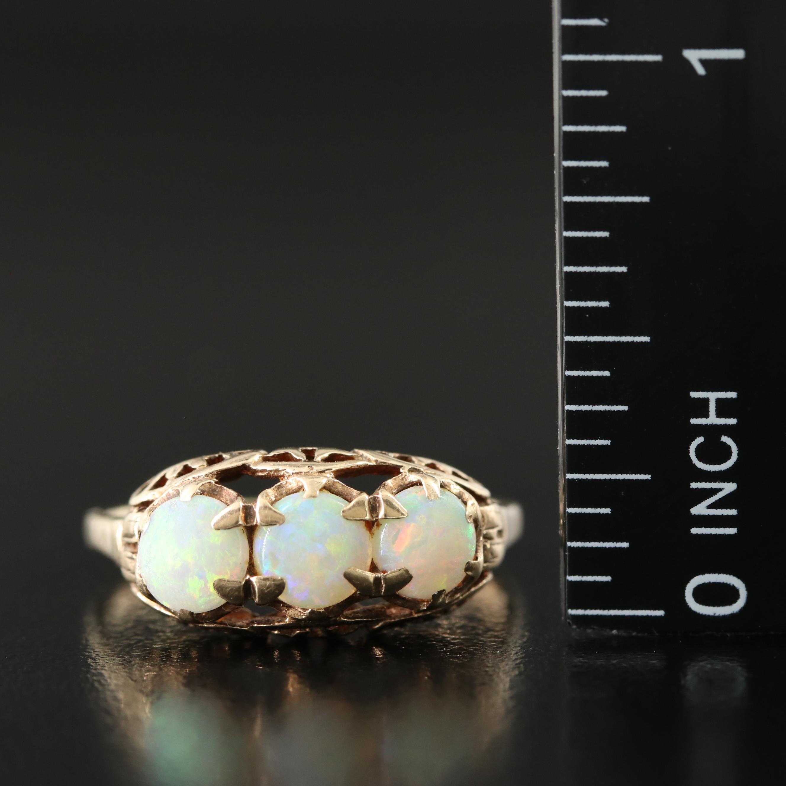 10K Opal Three Stone Ring