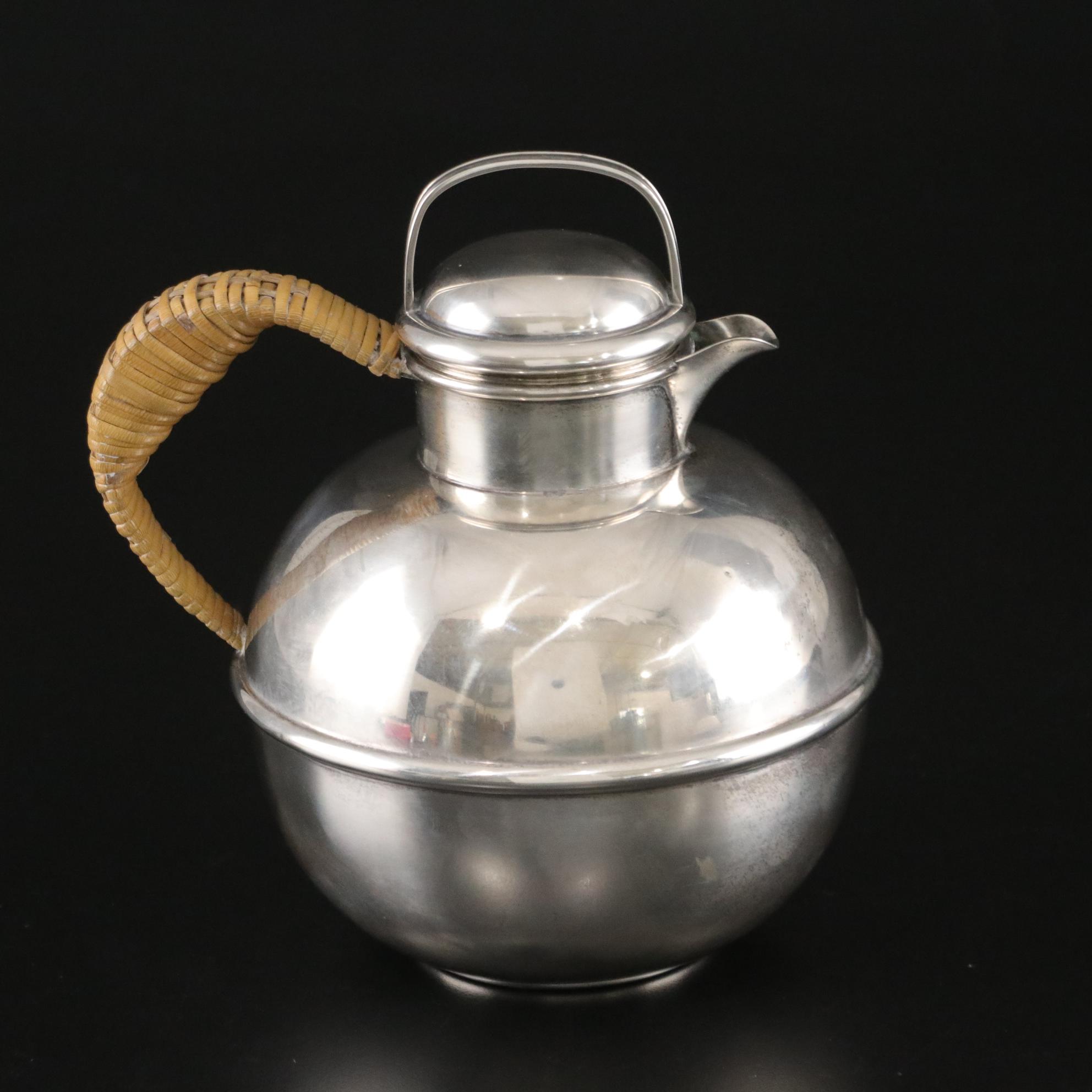 Grogan Co. Sterling Silver Hot Water Pitcher with Rattan Handle, Mid-20th C.