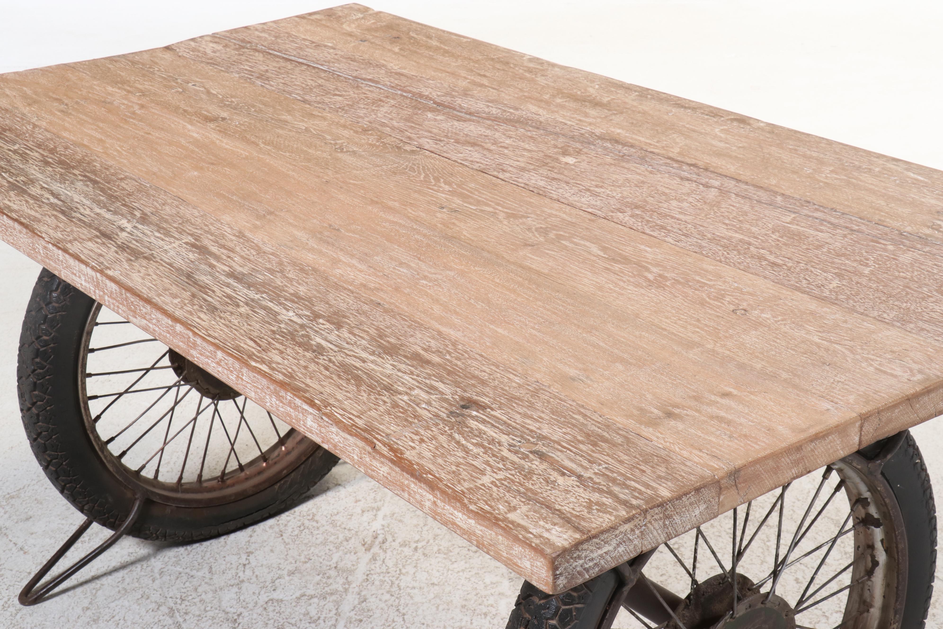 Steampunk Style Wooden Top Table with Reclaimed Tire Wheel Base