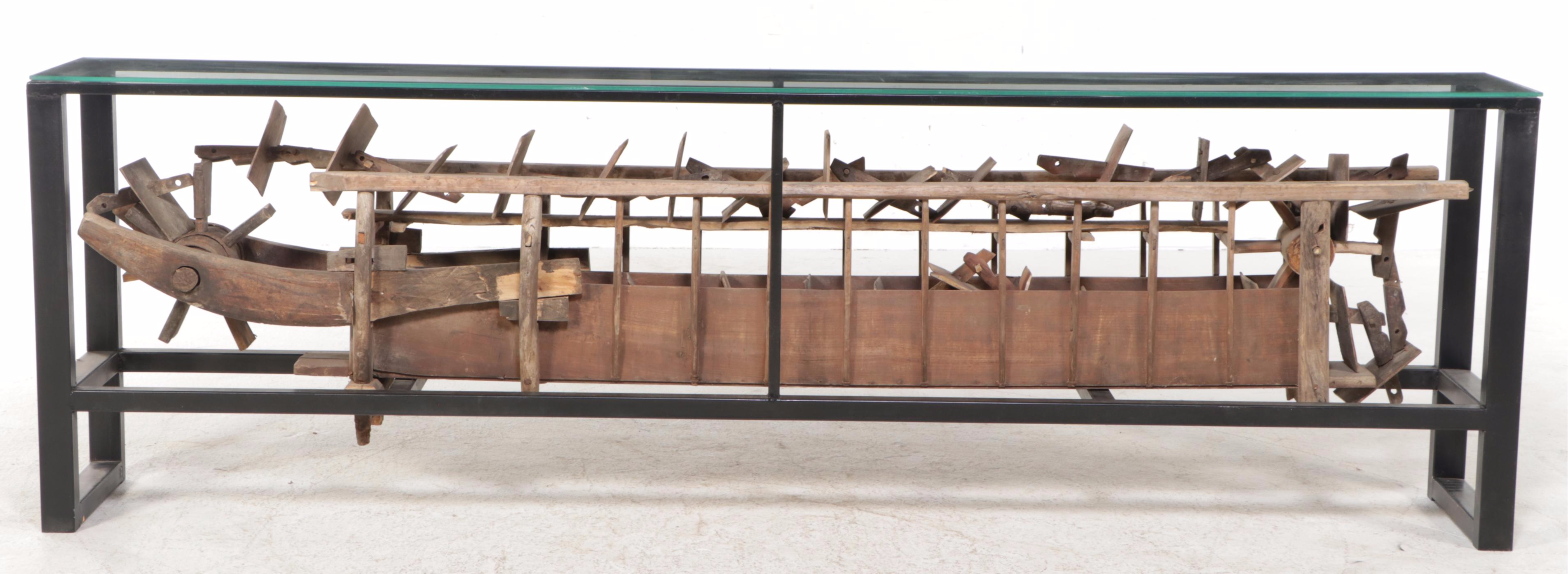 Metal and Glass Console Table with Folk Art Wooden Paddle Boat