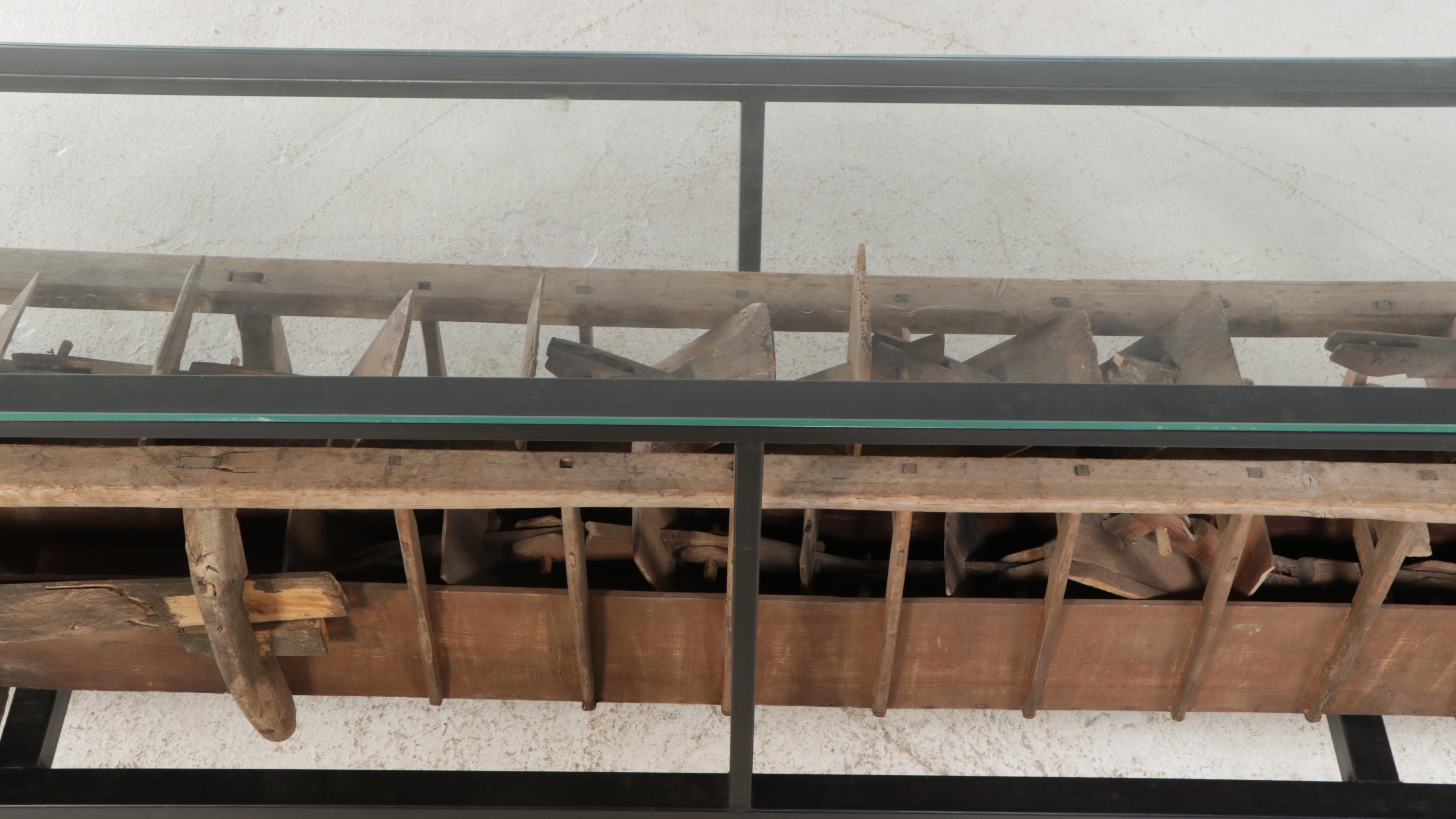 Metal and Glass Console Table with Folk Art Wooden Paddle Boat