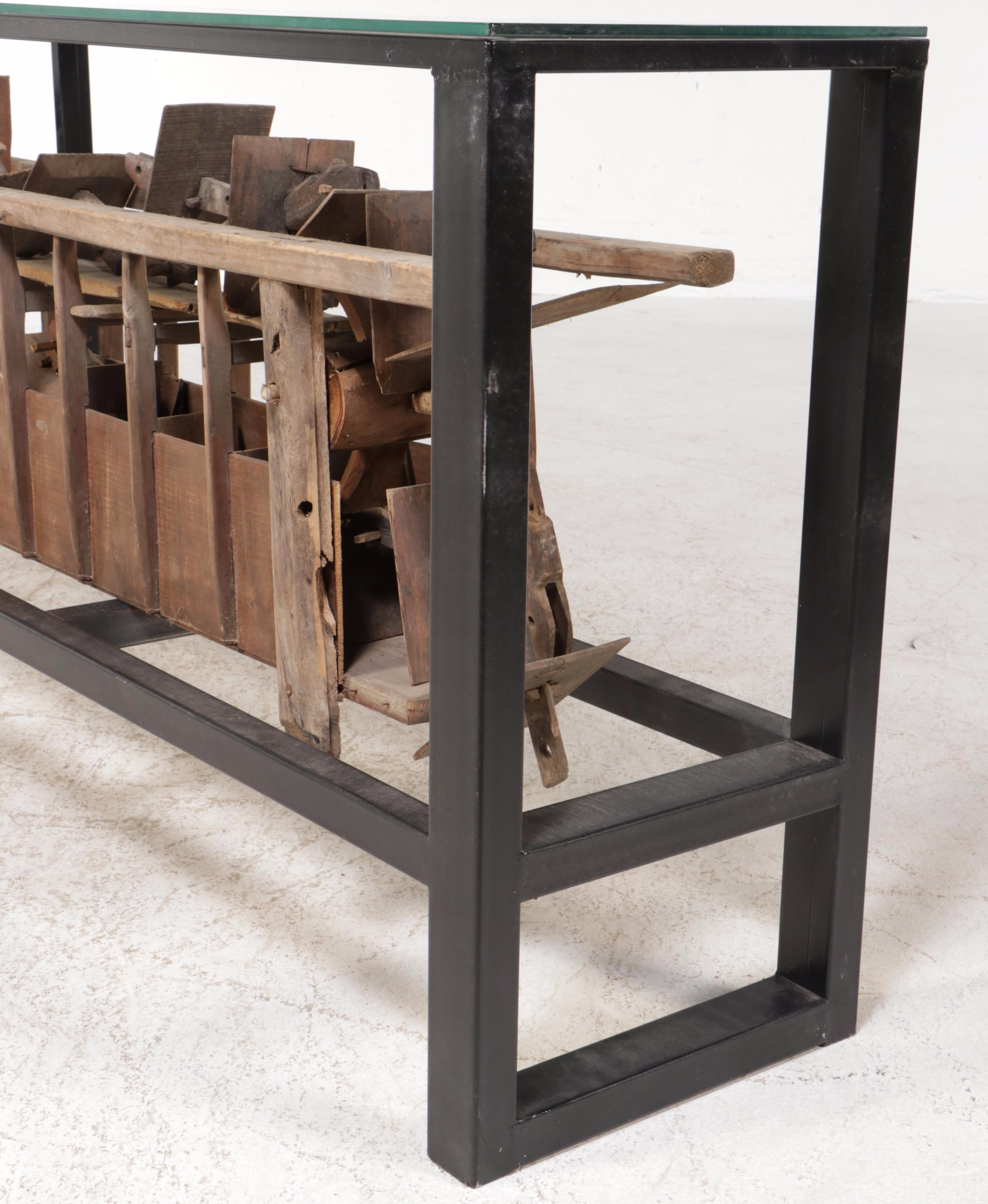 Metal and Glass Console Table with Folk Art Wooden Paddle Boat