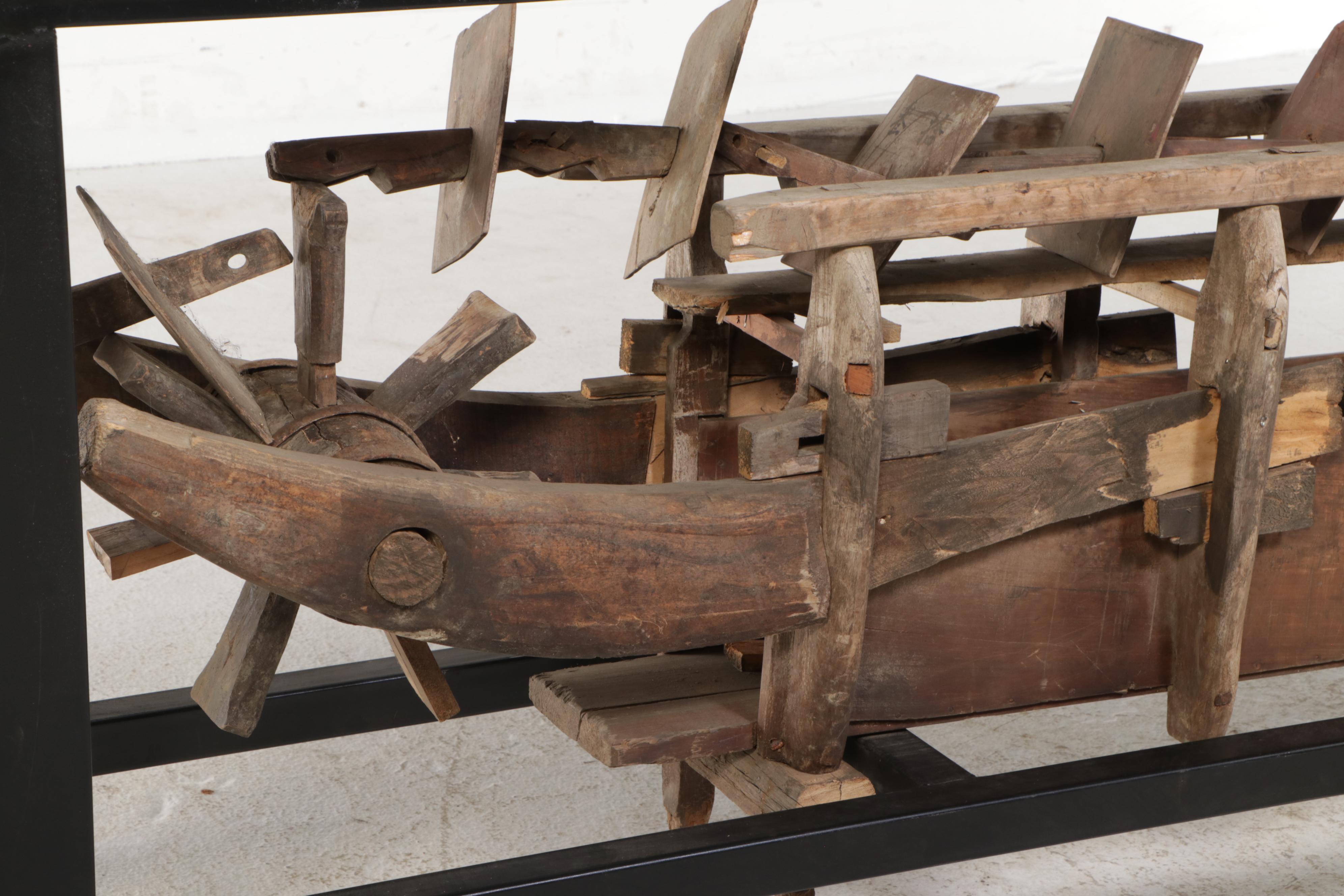 Metal and Glass Console Table with Folk Art Wooden Paddle Boat