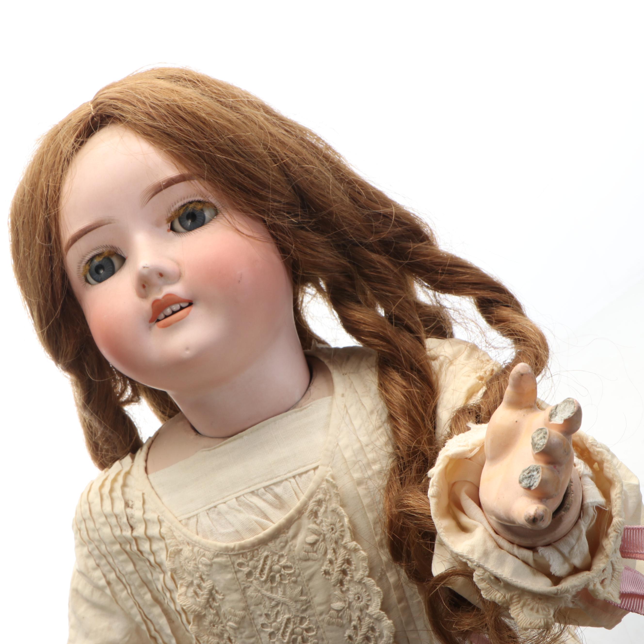 MAH Handwerck Socket Head and Jointed Composition Body Doll with Rocking Chair