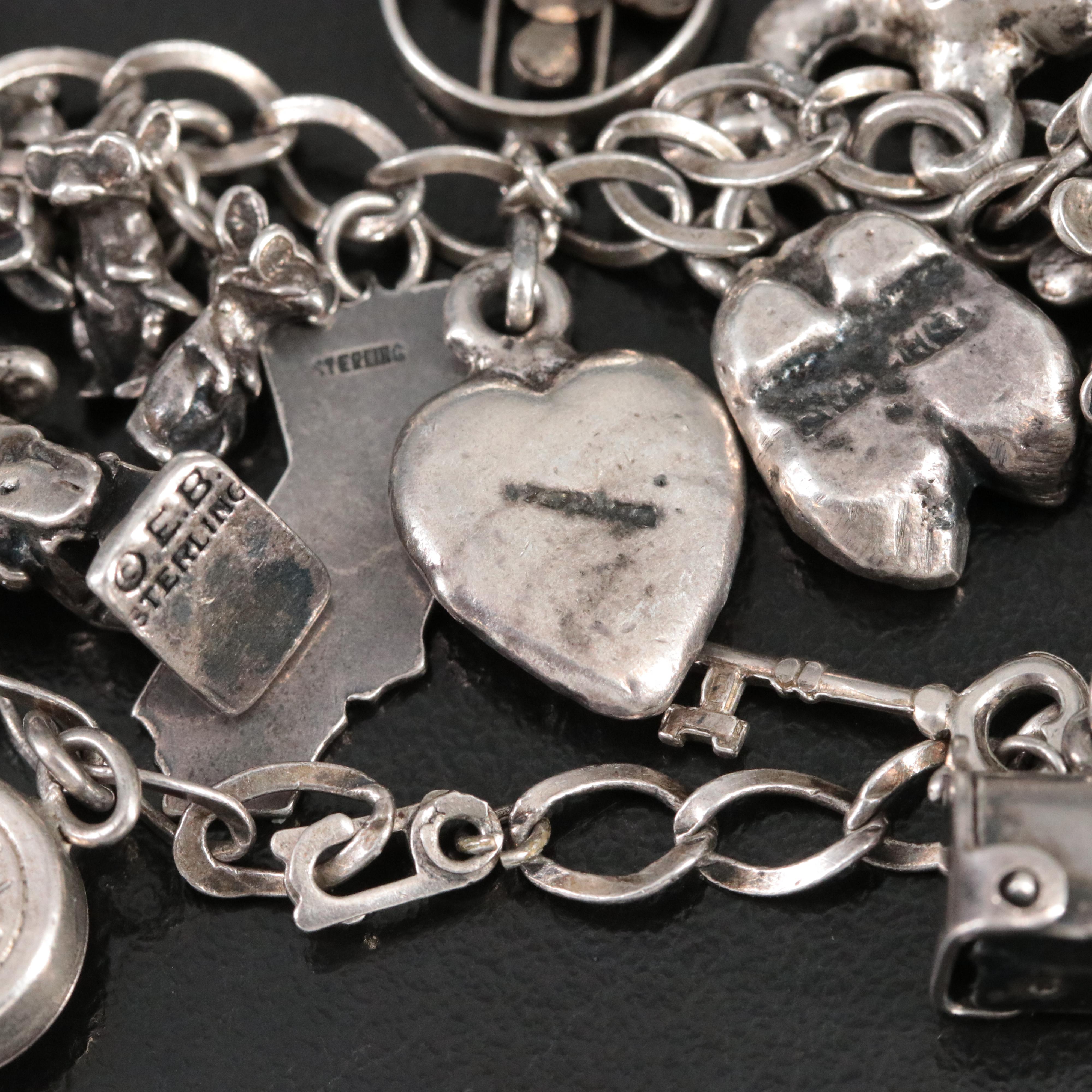 Vintage Charm Bracelet Featuring Sterling and Articulated Charms