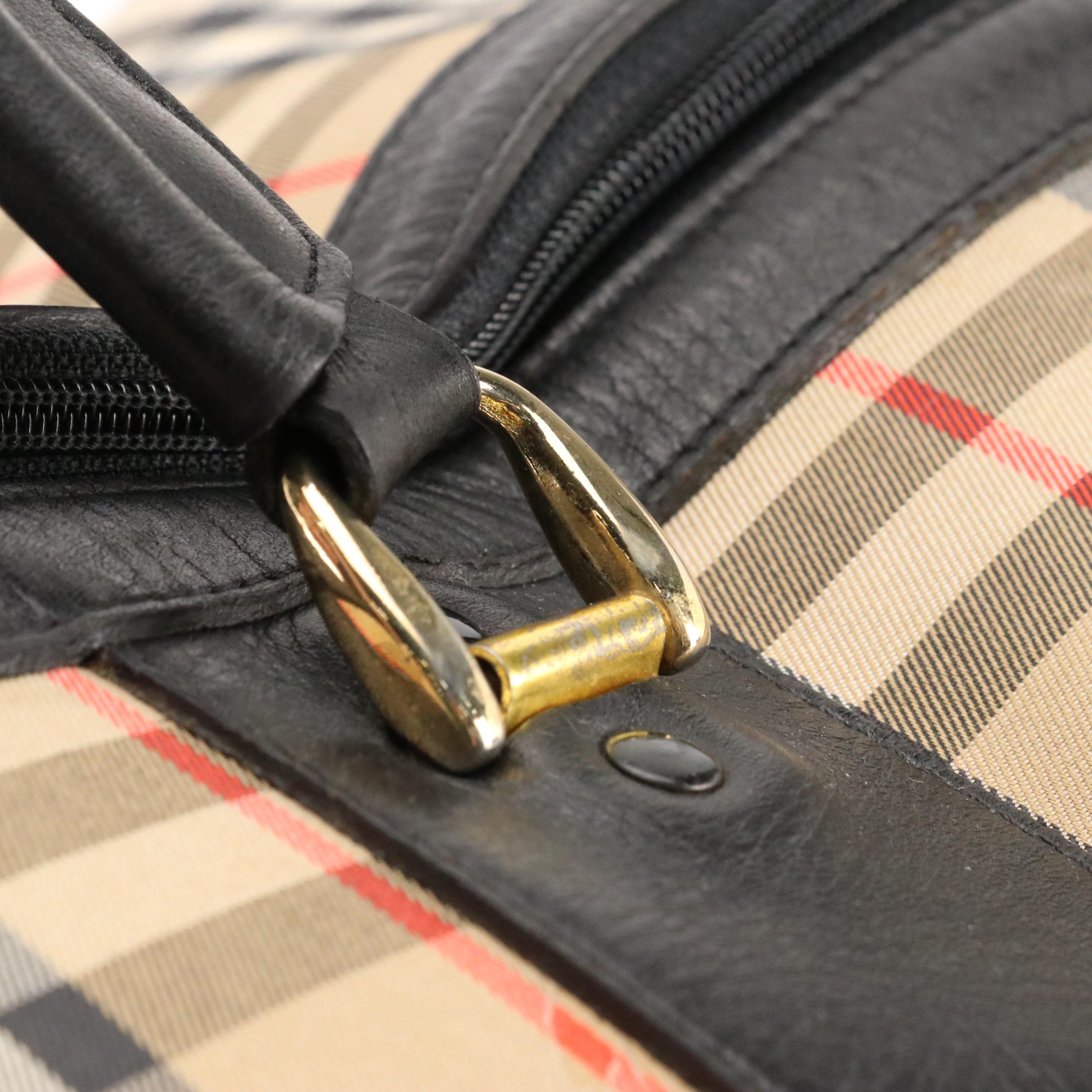 Burberrys Duffle Bag in Haymarket Check Canvas and Black Leather