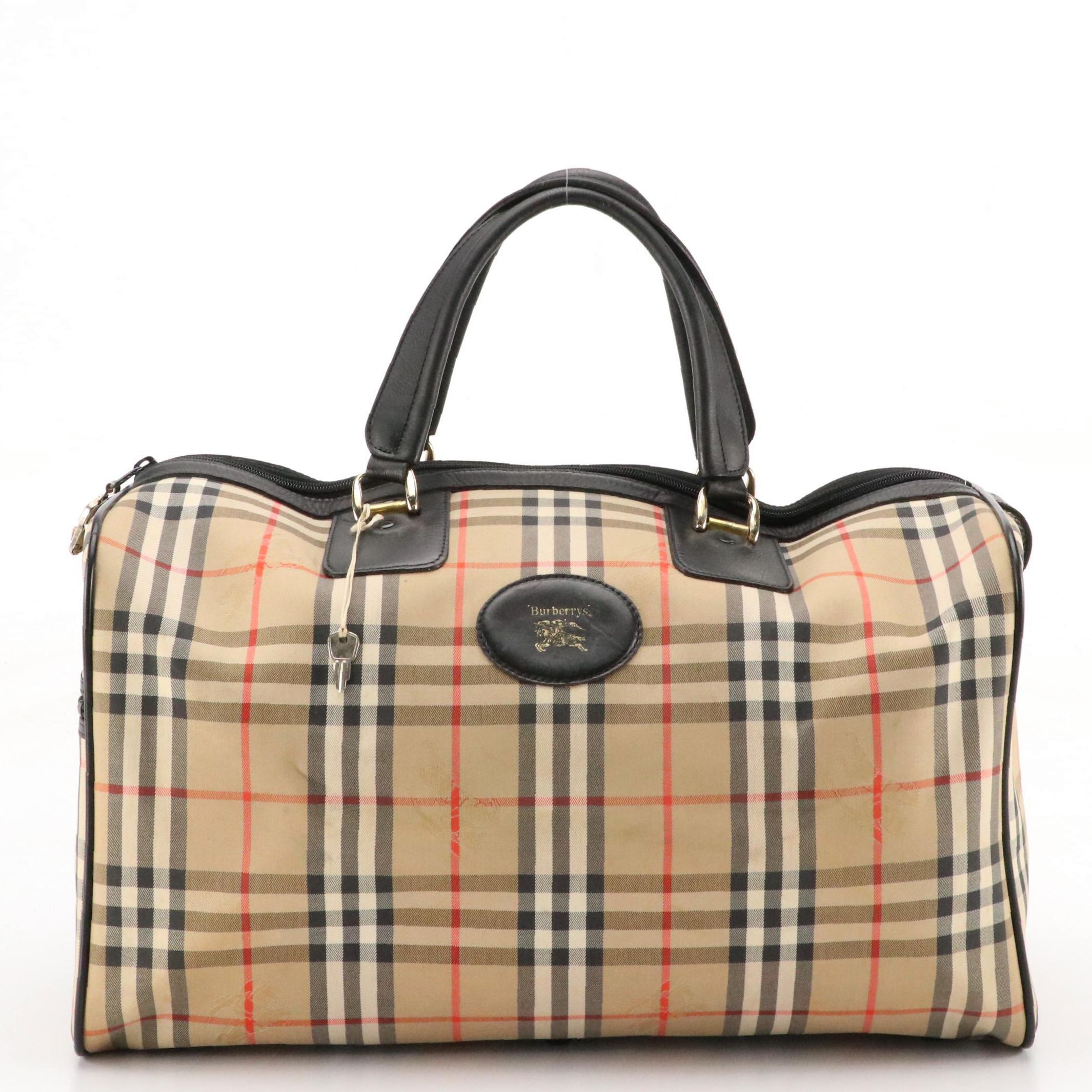Burberrys Duffle Bag in Haymarket Check Canvas and Black Leather