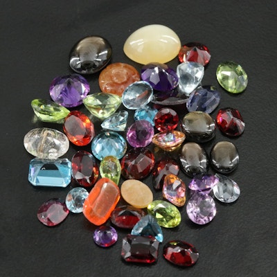 Loose Gemstone Lot Including Rutilated Quartz, Iolite and Peridot Loose Gemstone Lot Including Rutilated Quartz, Iolite and Peridot