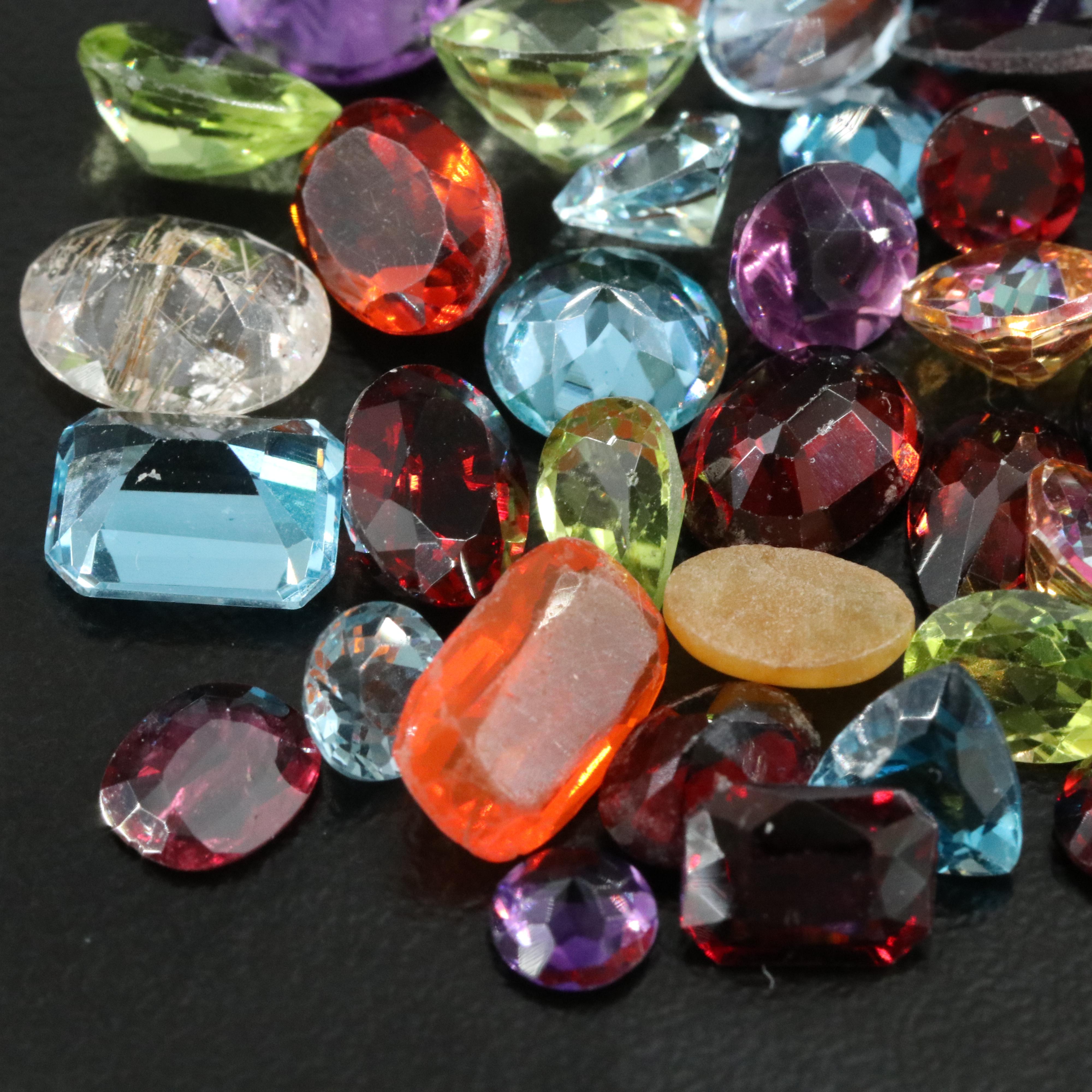 Loose Gemstone Lot Including Rutilated Quartz, Iolite and Peridot