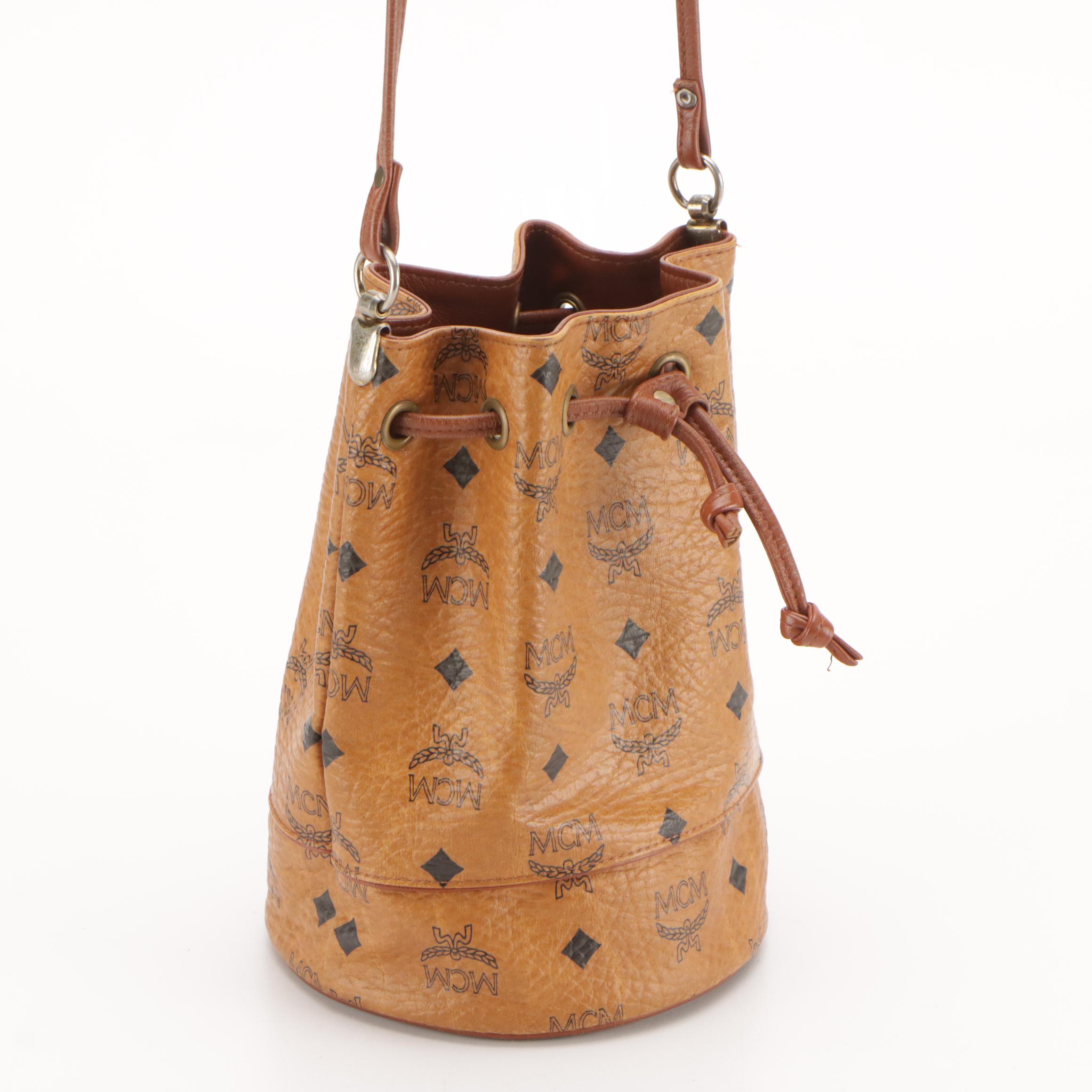 MCM Mini Drawstring Bucket Bag in Cognac Visetos Canvas with Leather Trim