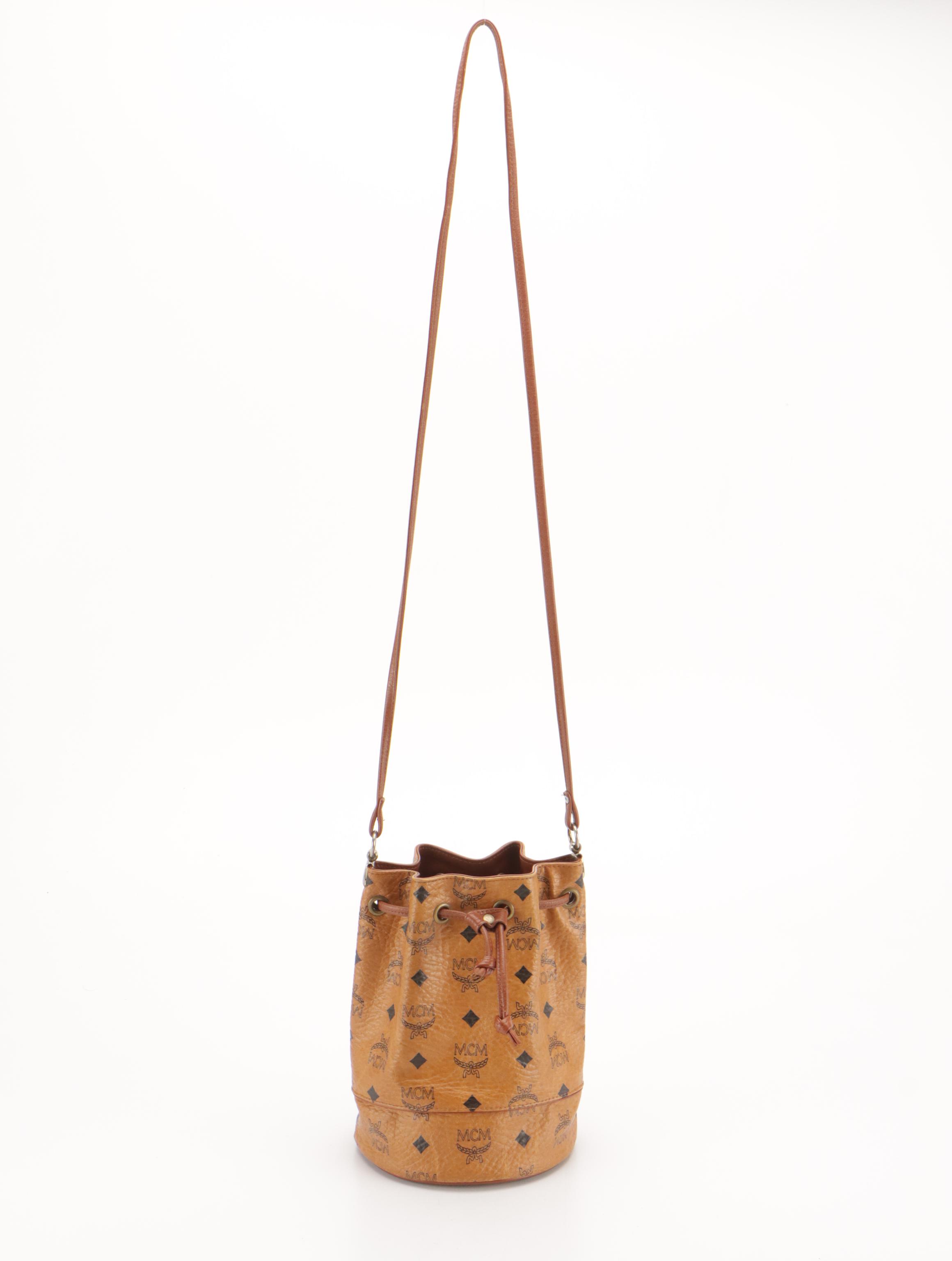 MCM Mini Drawstring Bucket Bag in Cognac Visetos Canvas with Leather Trim