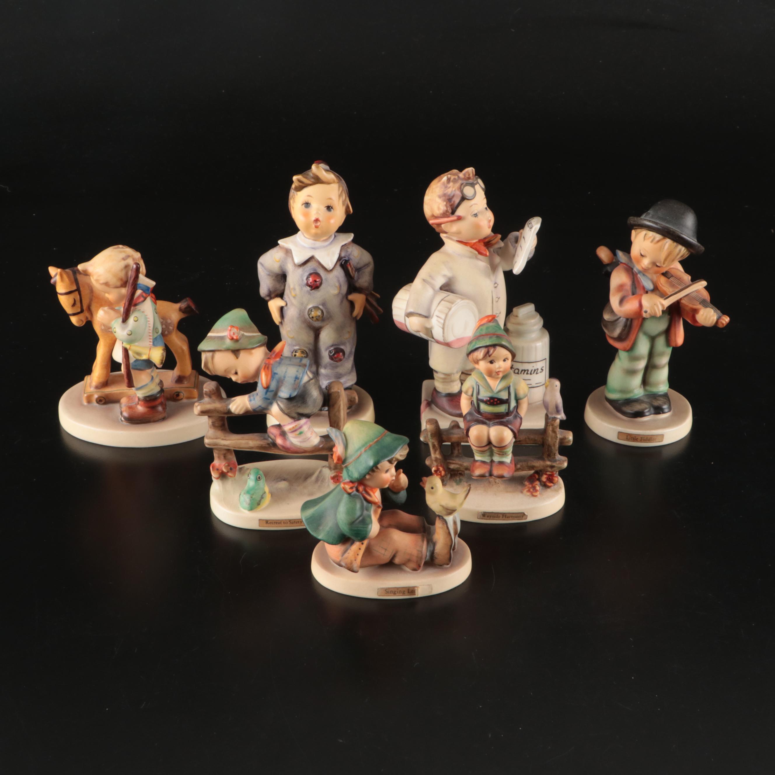 Goebel "Singing Lesson" with Other Hummel Figurines