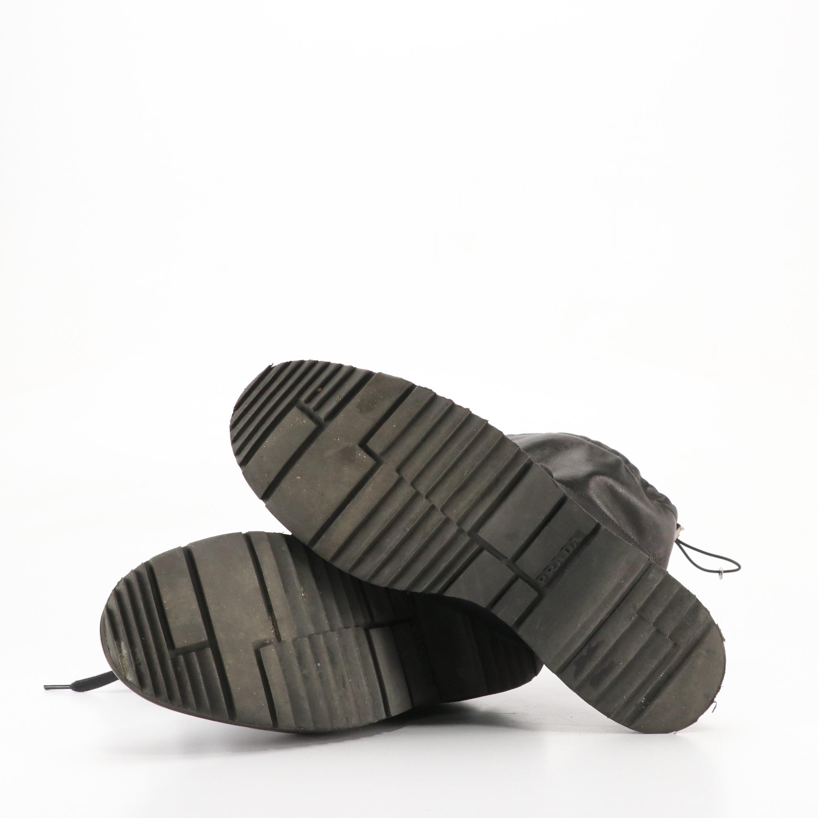 Prada Mid-Calf Wingtip Boots in Black Leather