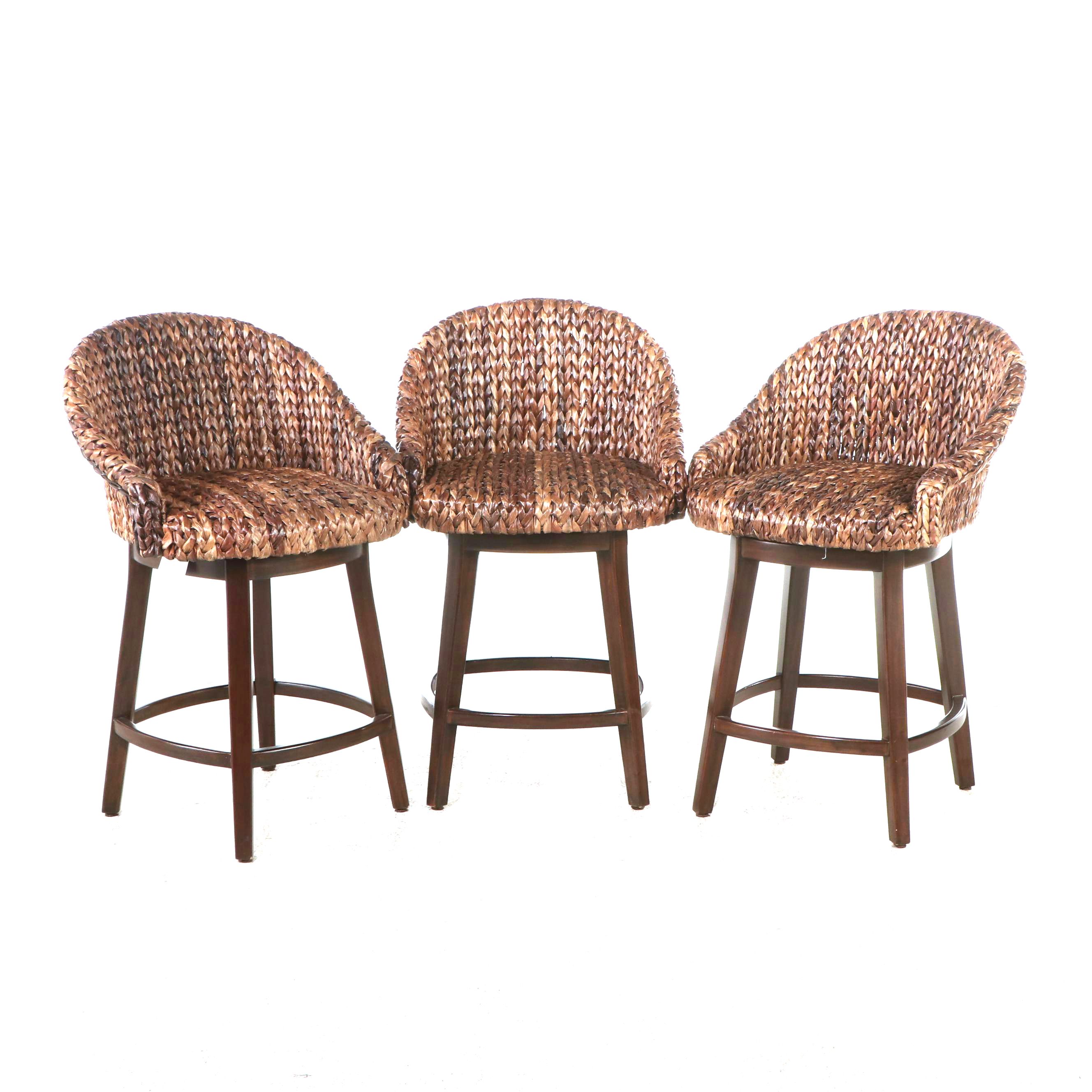 Three Pottery Barn Seagrass Bucket Swivel Stools