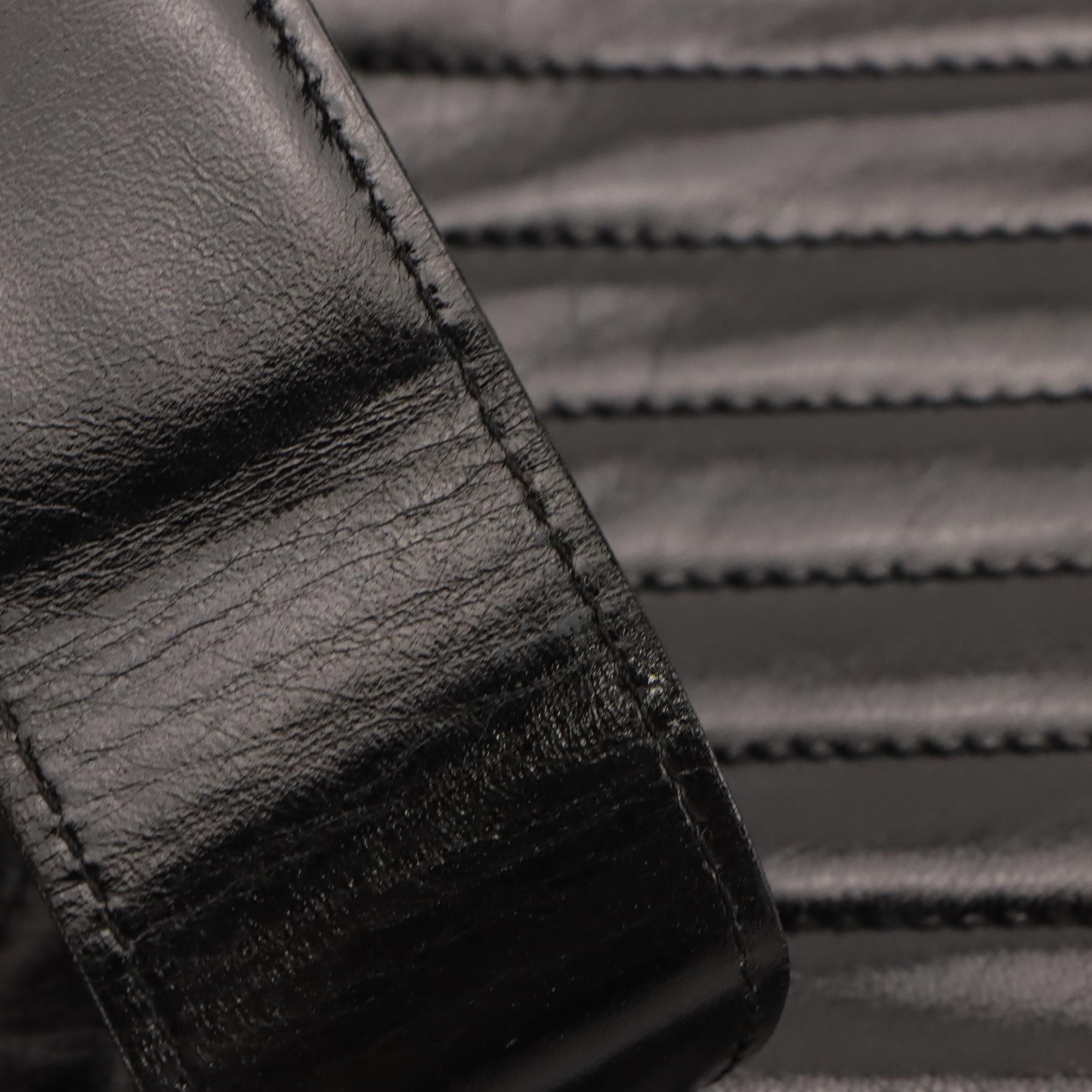 Yves Saint Laurent Hinge Clutch in Black Chevron Leather