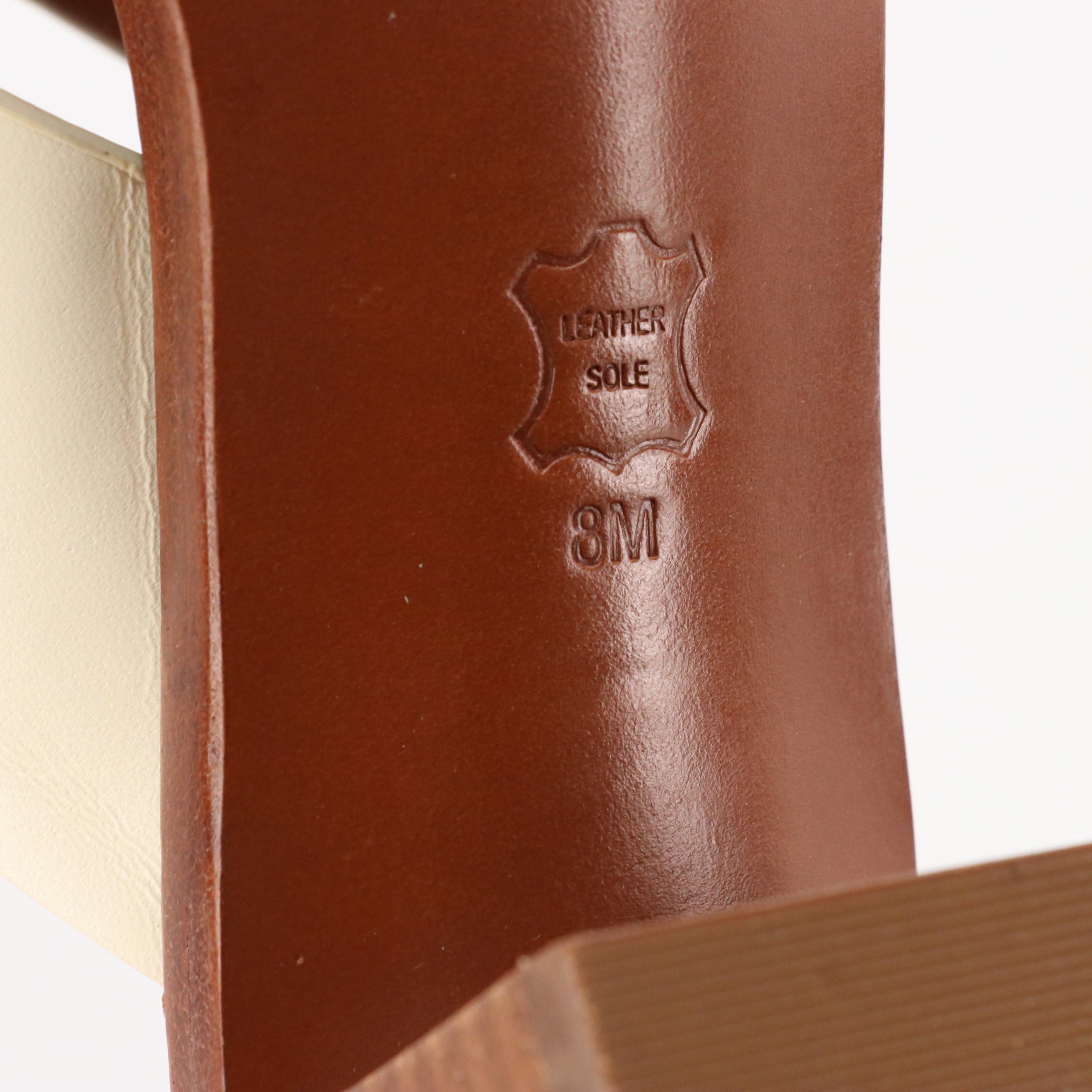 Tory Burch Ivory Leather 'Montrose' Mules and Sorel 'Ella II' Flat Sandals