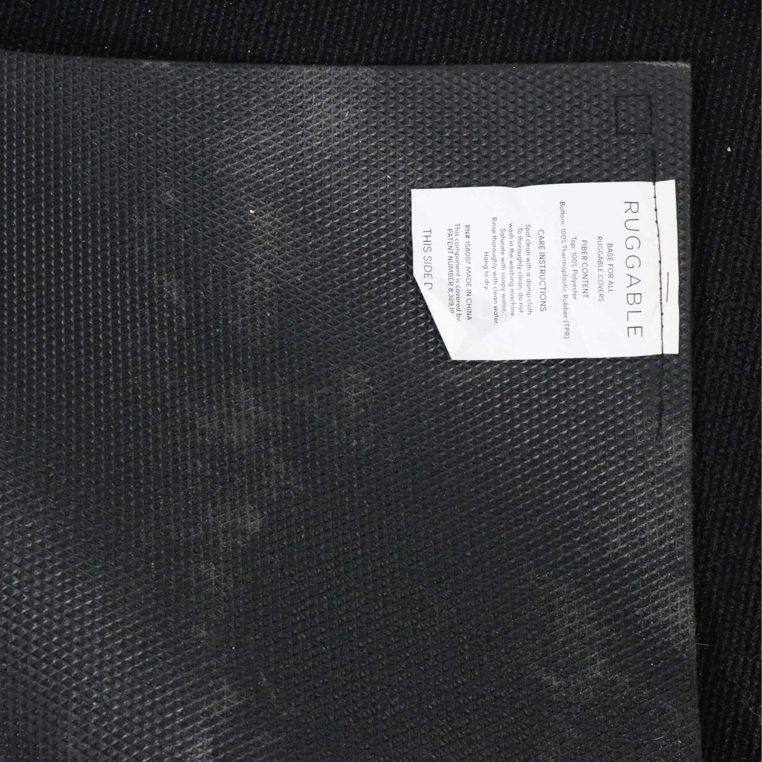 6'1 x 8'11 Machine Made Ruggable Area Rug with Base