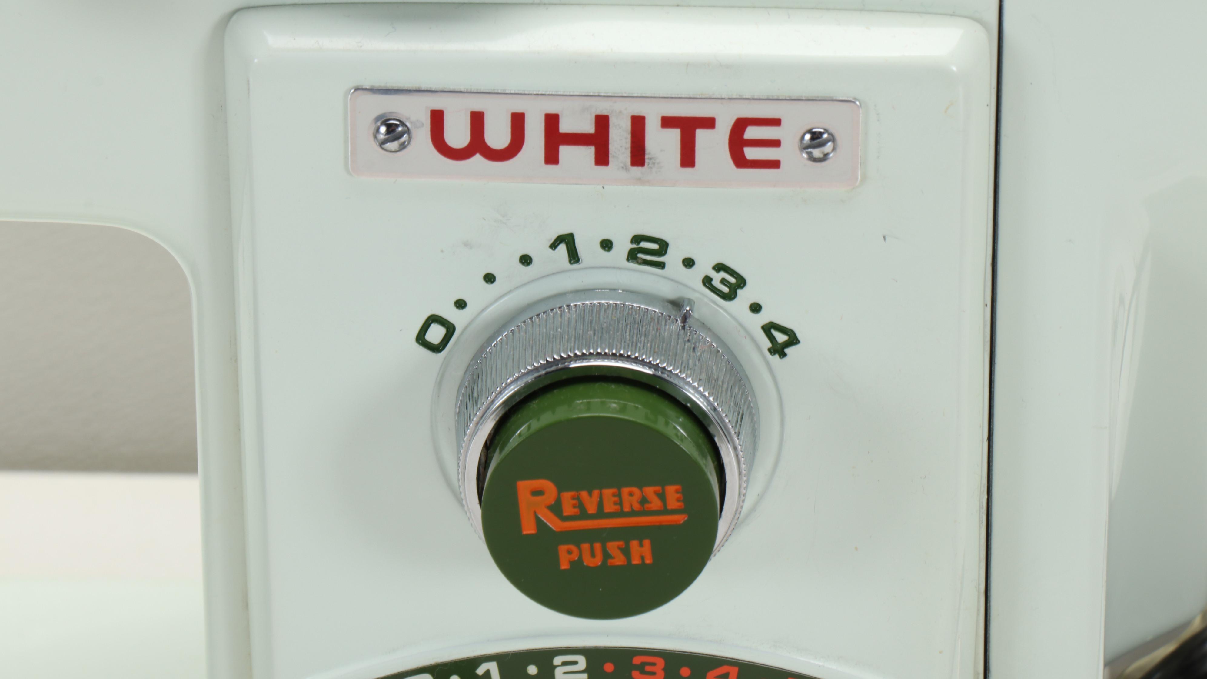 White Electric Sewing Machine with Plastic Carrying Case